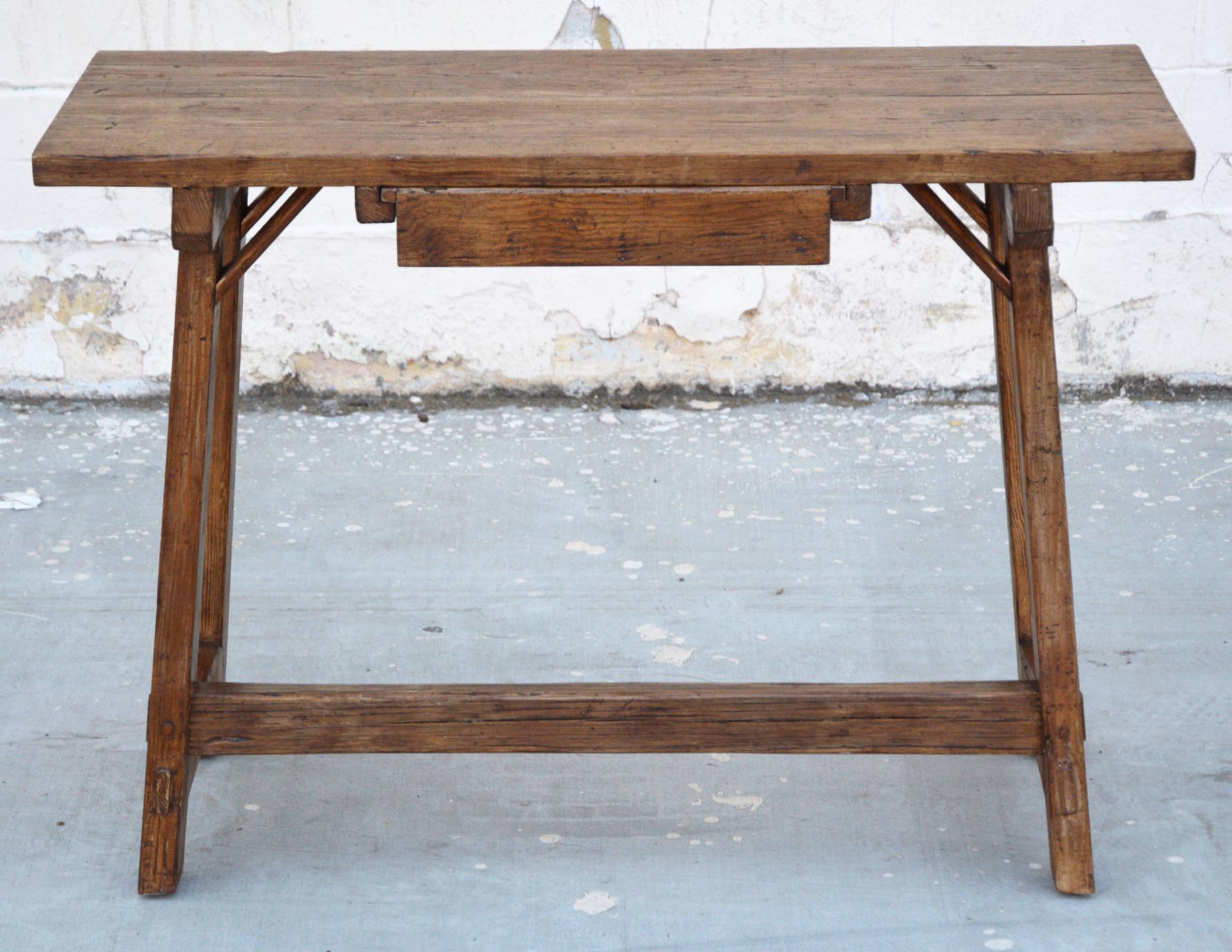 This custom desk or writing table is made from reclaimed pine with one large drawer that can be pulled out from either side. The table shown here is 17.5