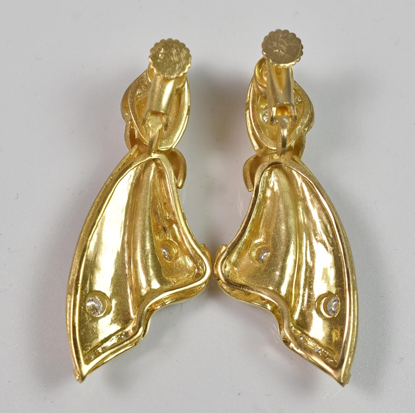 American, 2nd half-20th century. Each earring custom designed as a diamond set gold furled ribbon drop, hinged at top with screw back clips. Forty round diamonds, estimated total weight 1.60cts, clarity VS, color F/G. Very good condition. Overall