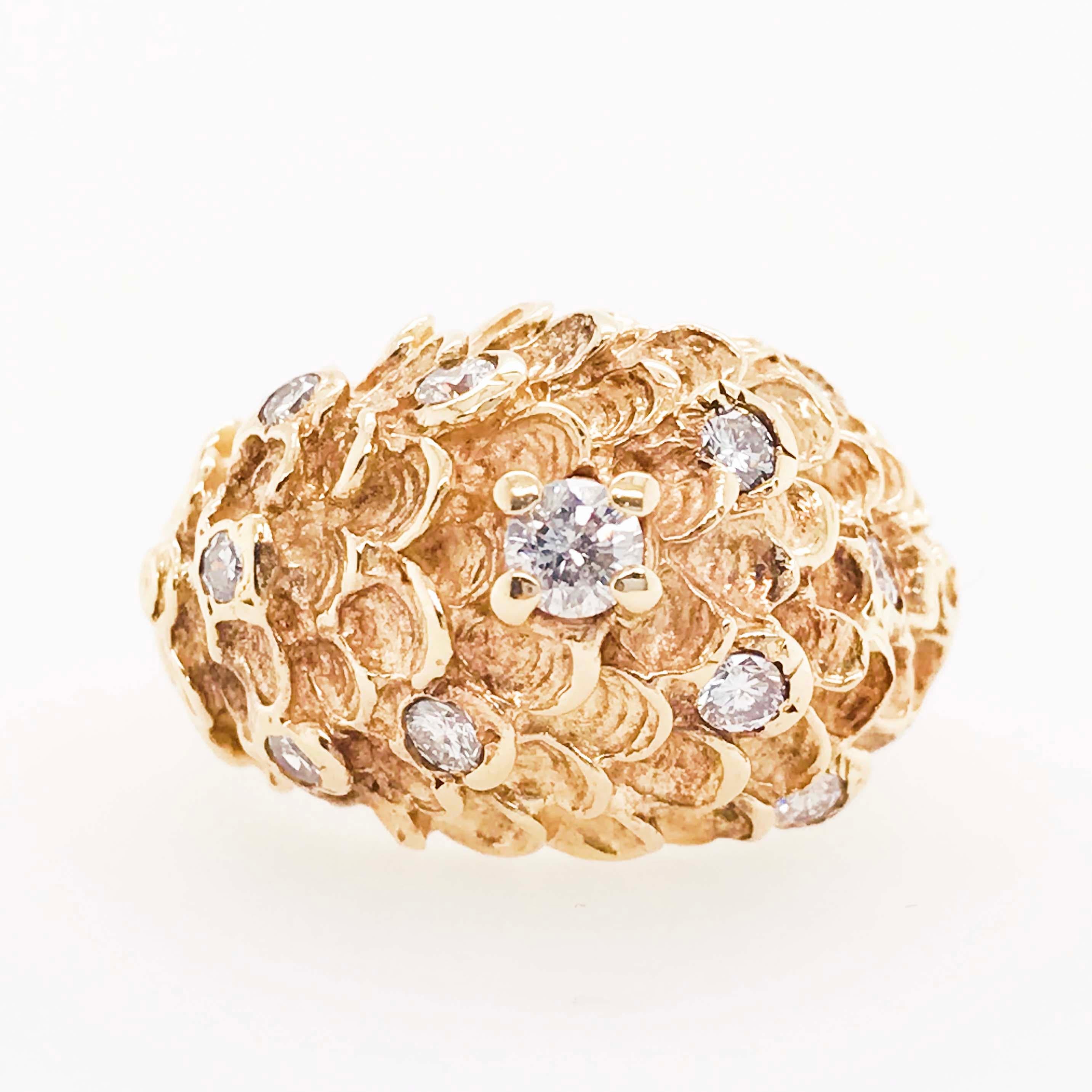 Diamond cocktail rings are always statement pieces with unique designs and quality diamonds or gemstones! This diamond cocktail ring is a dome setting with an extraordinary design. The diamond dome ring has eleven round brilliant diamonds set in