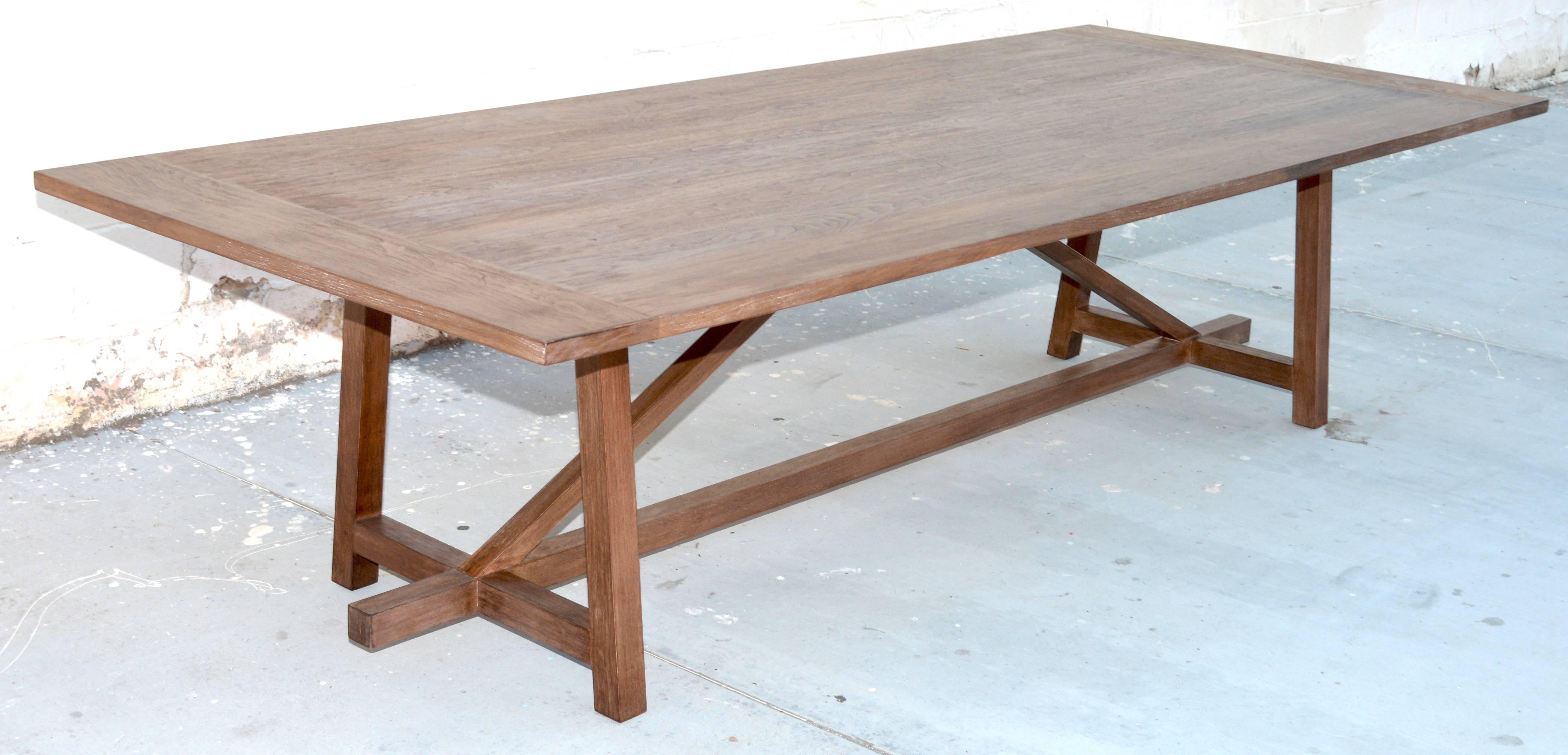 This custom dining table built in aged walnut is one of many tables we build to order using hand selected planks. The specific size shown here is 120 inches x 48 inches x 30 inches H, in black walnut. This table also has the option of expandable