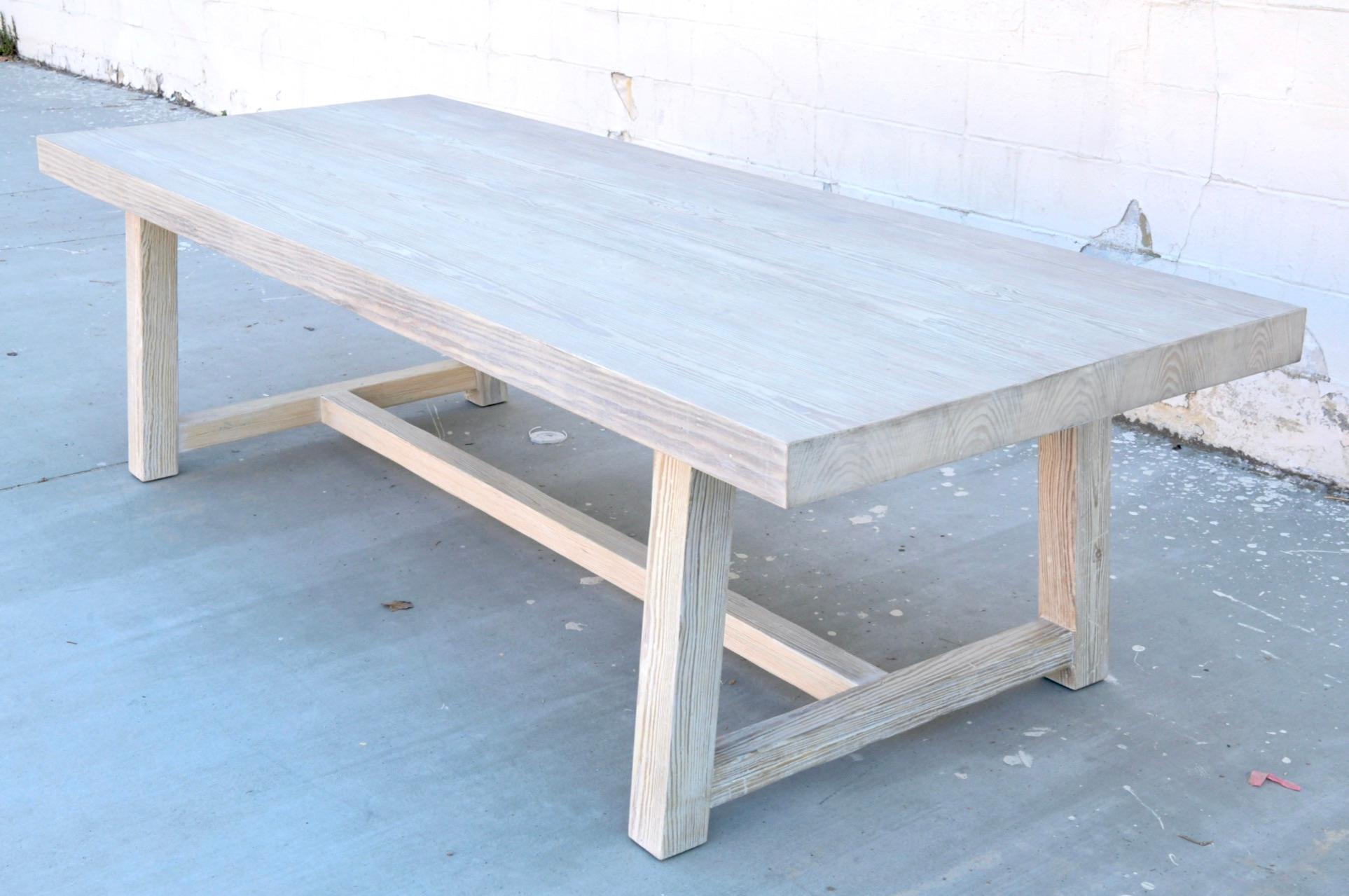 This chunky dining table made from reclaimed pine is seen here in 108