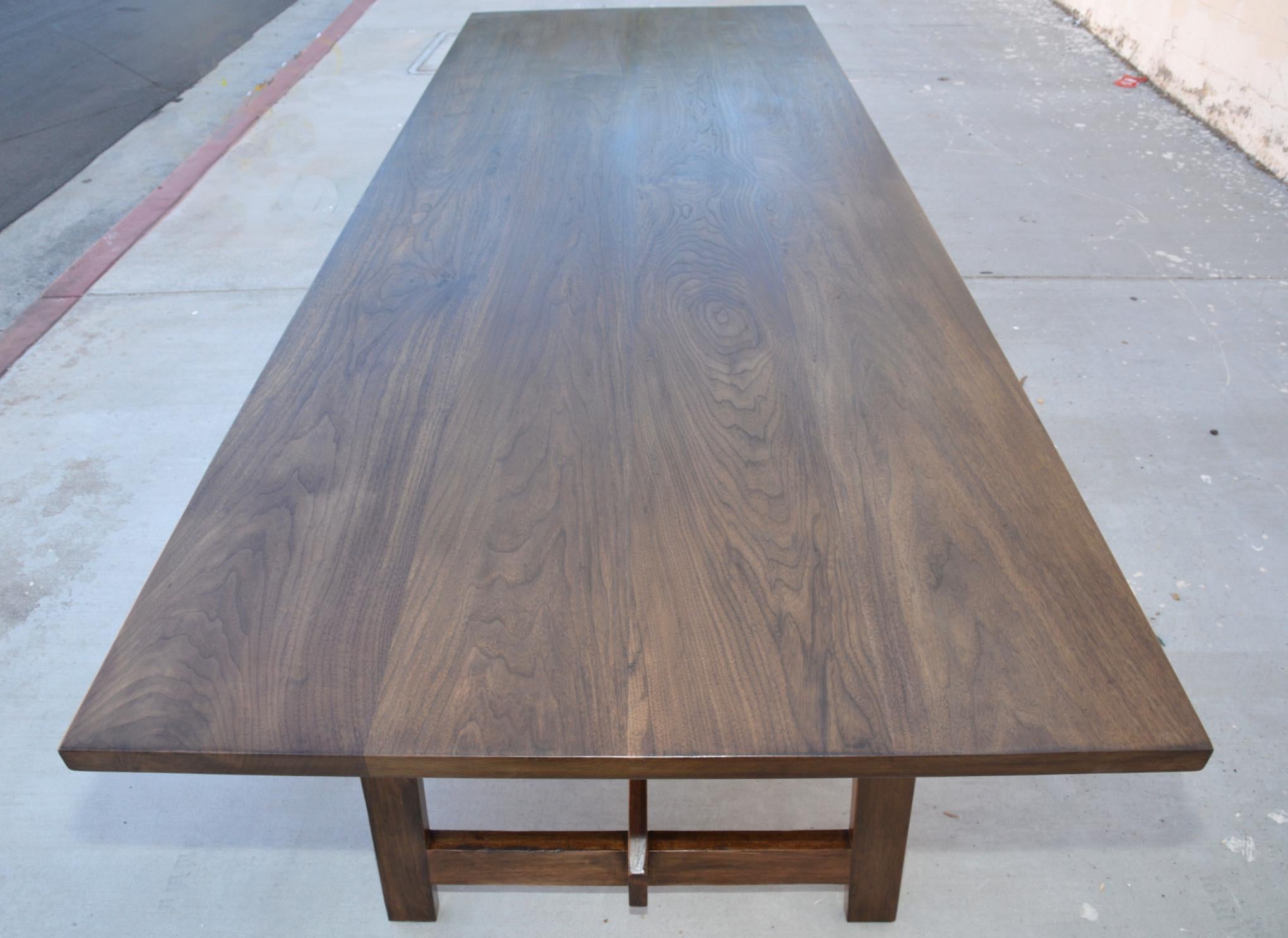 This custom walnut dining table is seen here in 120