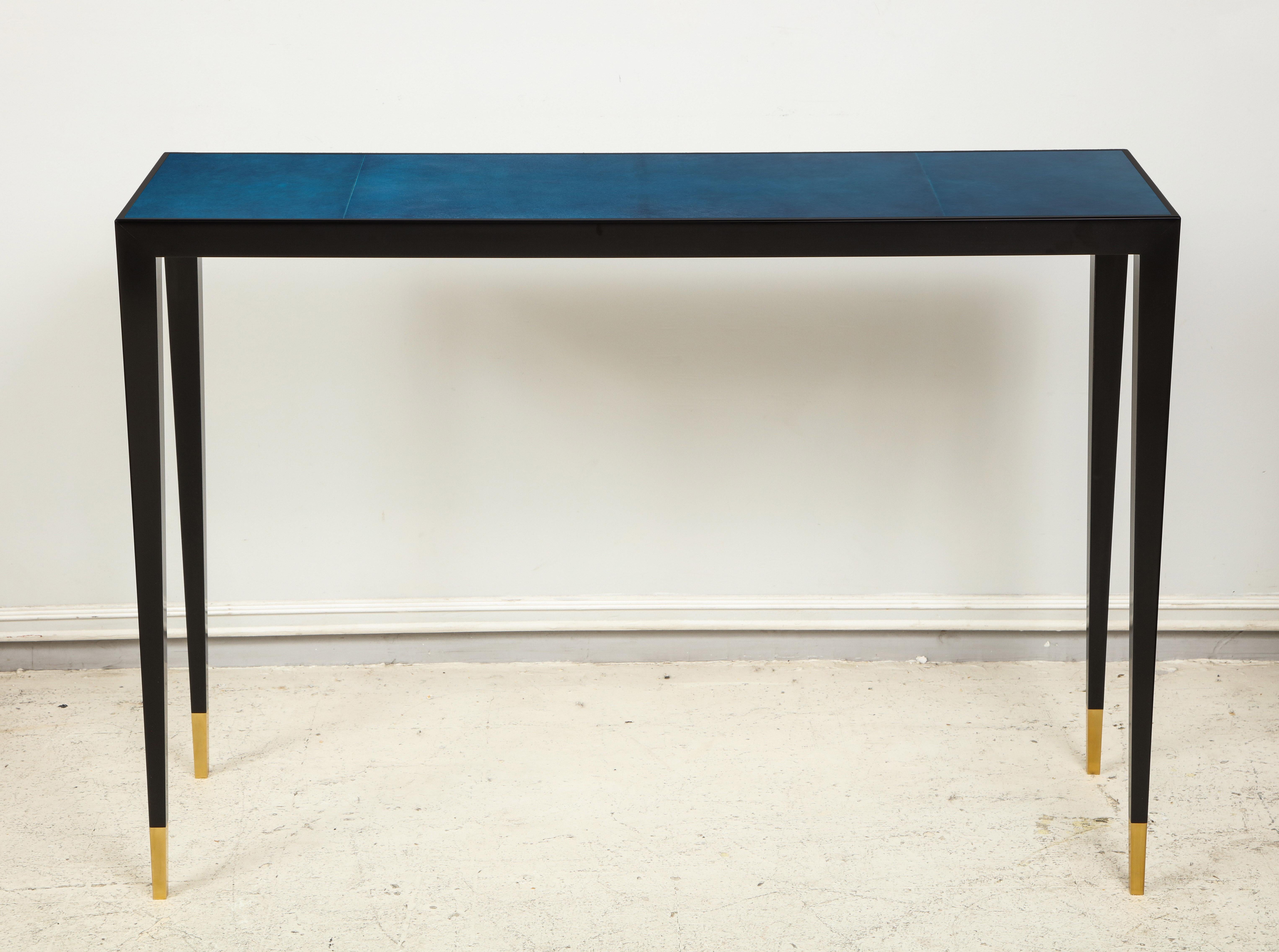 Custom ebonized console with blue parchment top in the Jean Michel Frank manner. It would take about 8 weeks to make this piece.