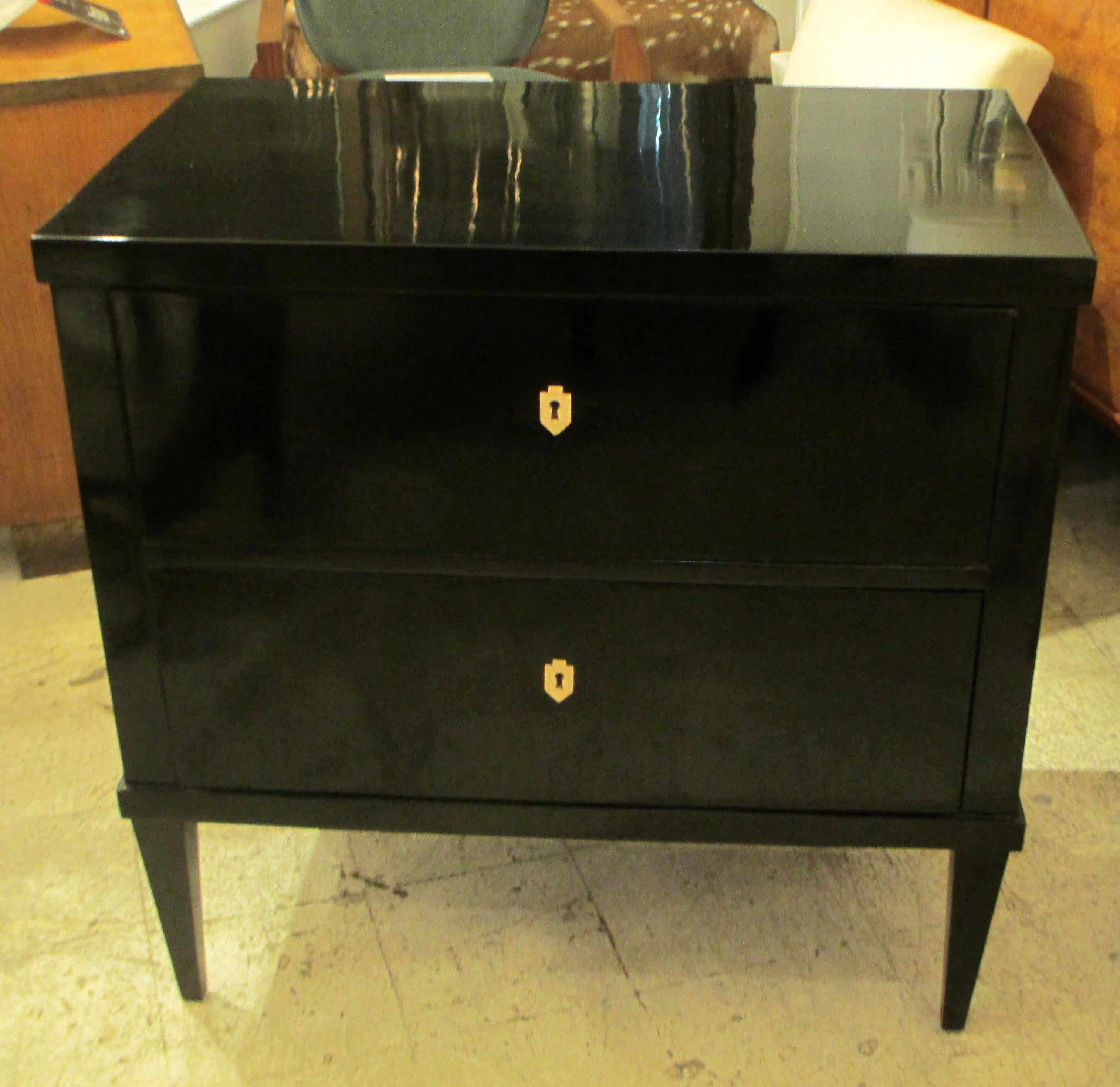 Custom ebonized Louis XVI style chest/commode on tapered legs with ebony escutcheons. Please note that this chest is customizable and can be made in the wood of your choice- cerused oak, mahogany, walnut, lacquered in any color. Please inquire about