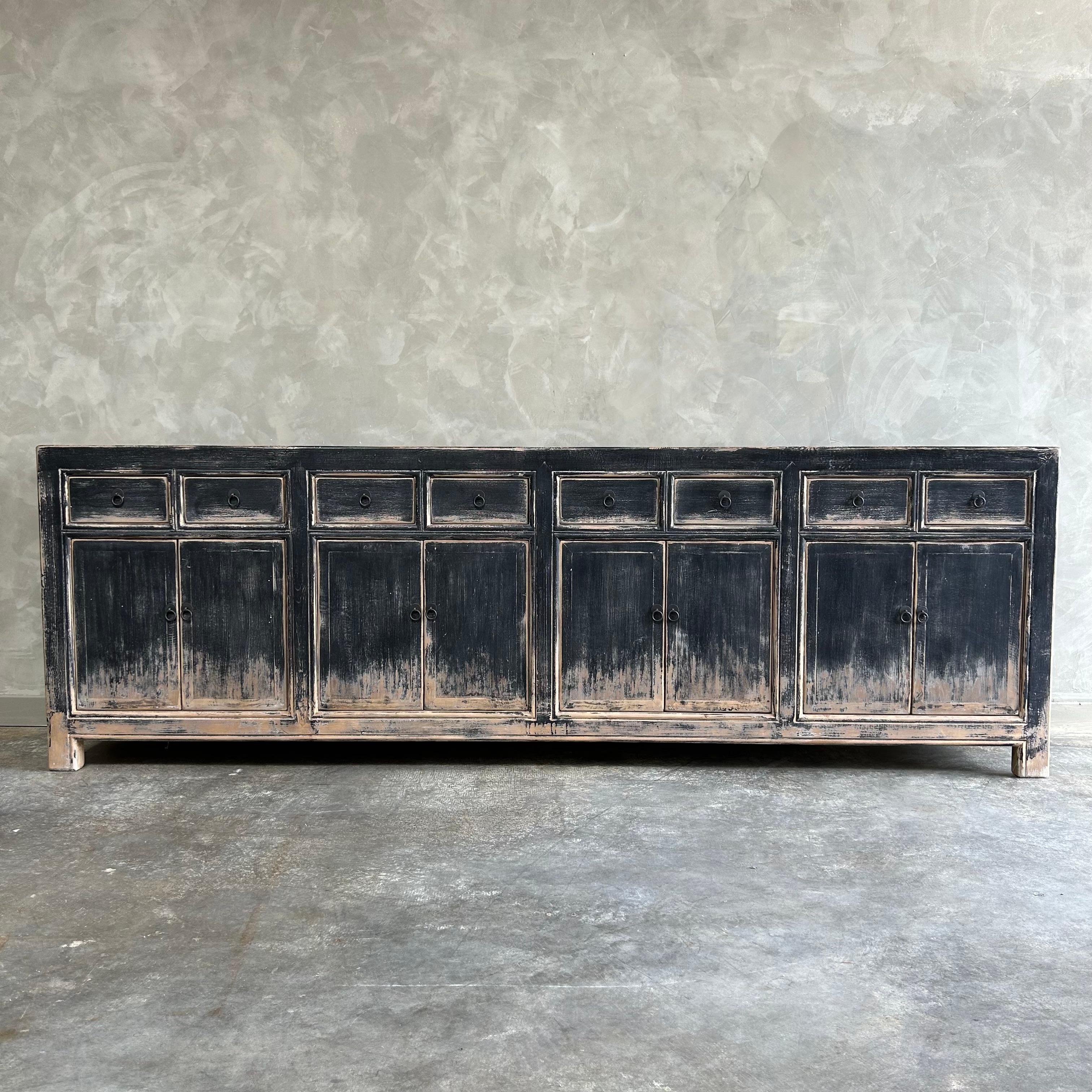 Custom made reclaimed wood cabinet by bloom home inc. 
These old elm timbers show in its most primal, natural form. The artisanal construction methods highlight the elm woods beautiful grain pattern & knots and fissures from its past life. The most
