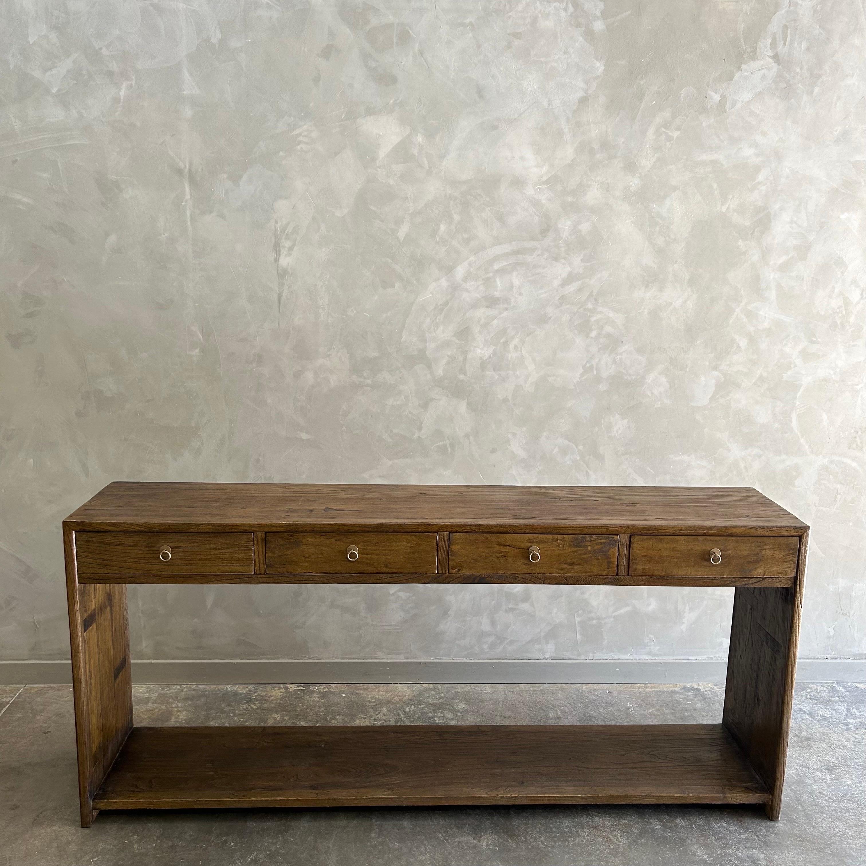 BH COLLECTION
Ivan Drawer Console Drawer 
The Iman Console is made from beautiful but durable Elm Wood and features 4 drawers for extra storage. The Ivan Console makes the perfect entryway piece, console table or sofa table. Please note variances in