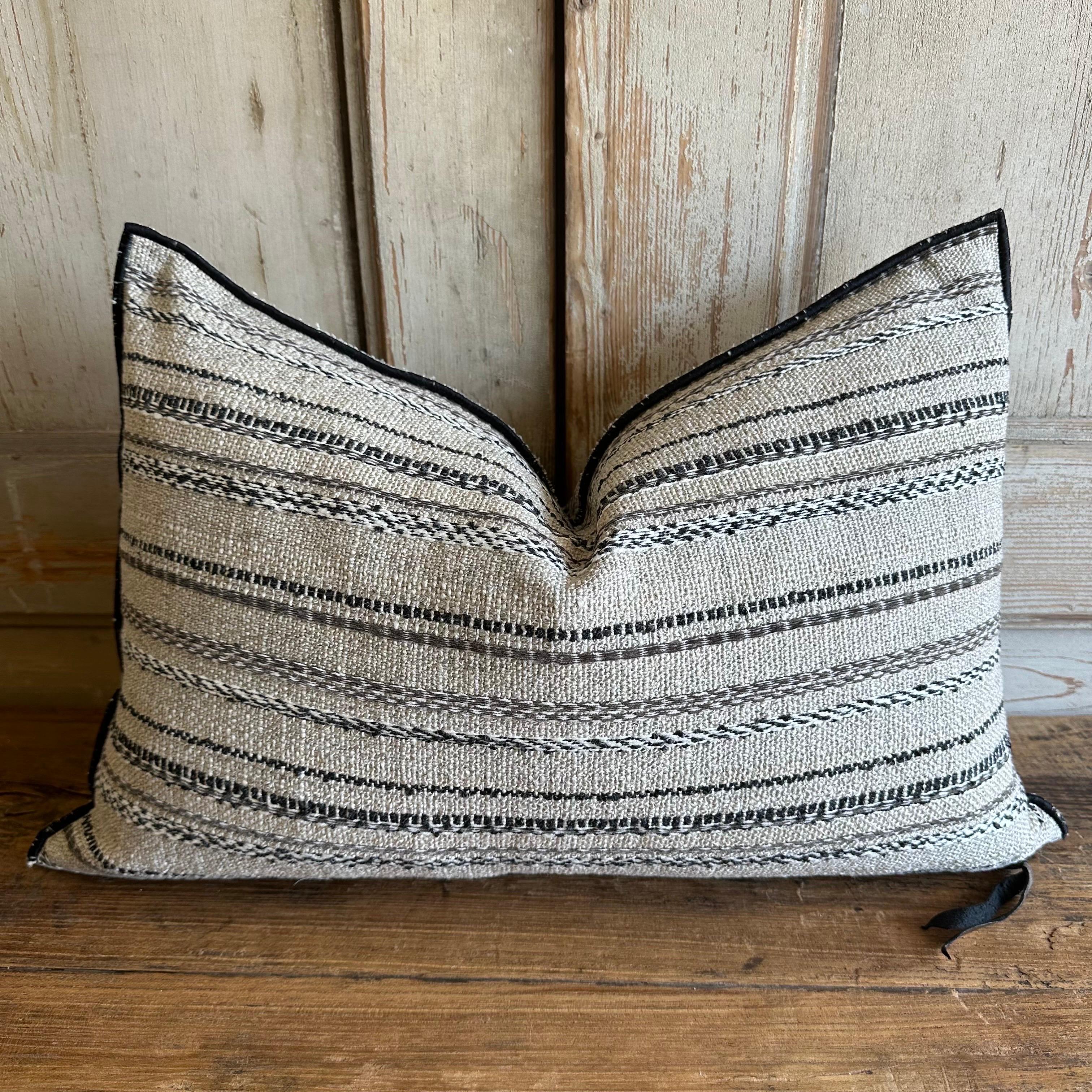 Custom made linen and wool embroidered stripe pillow cover.
Size: 15x23
Exquisite thick nubby linen in a flax natural with embroidered stripes in coal, white and cocoa brown.
Brass zipper closure, finished with a black stitched binded edge.
Made