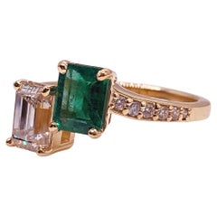 Custom Emerald Cut Diamond and Emerald Gold Ring