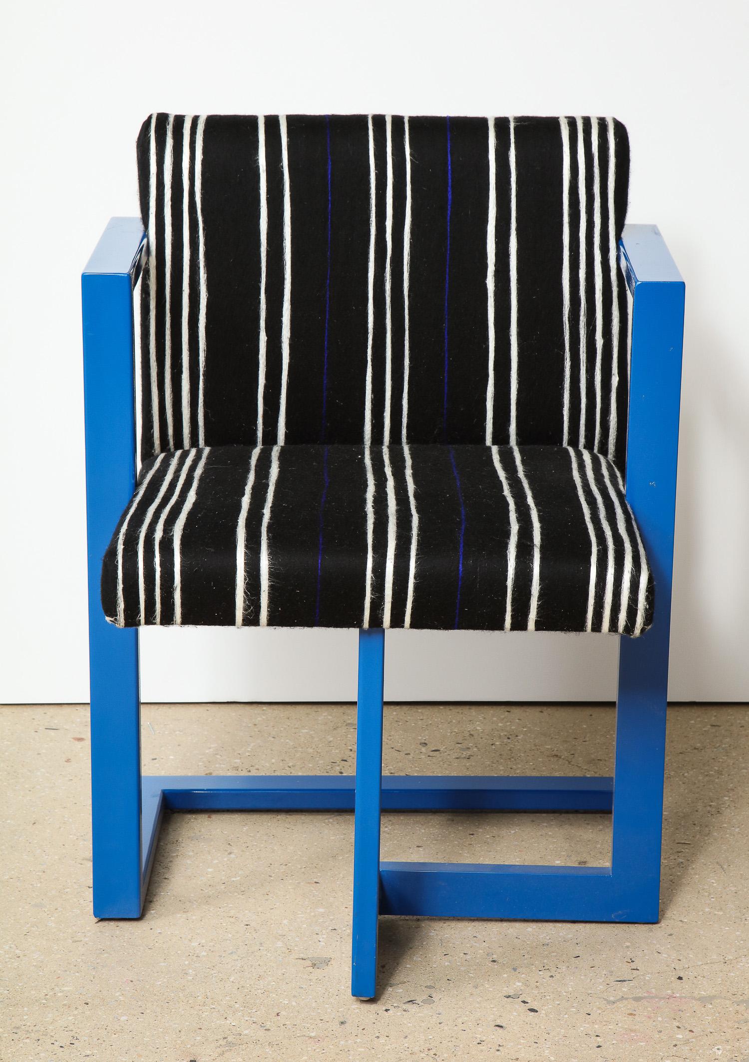 A custom enamled steel sculptural chair, made in the USA to order in a variety of finishes.