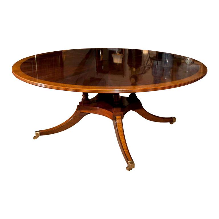 Custom English 72" Diameter Mahogany Starburst Dining Table with Leaf