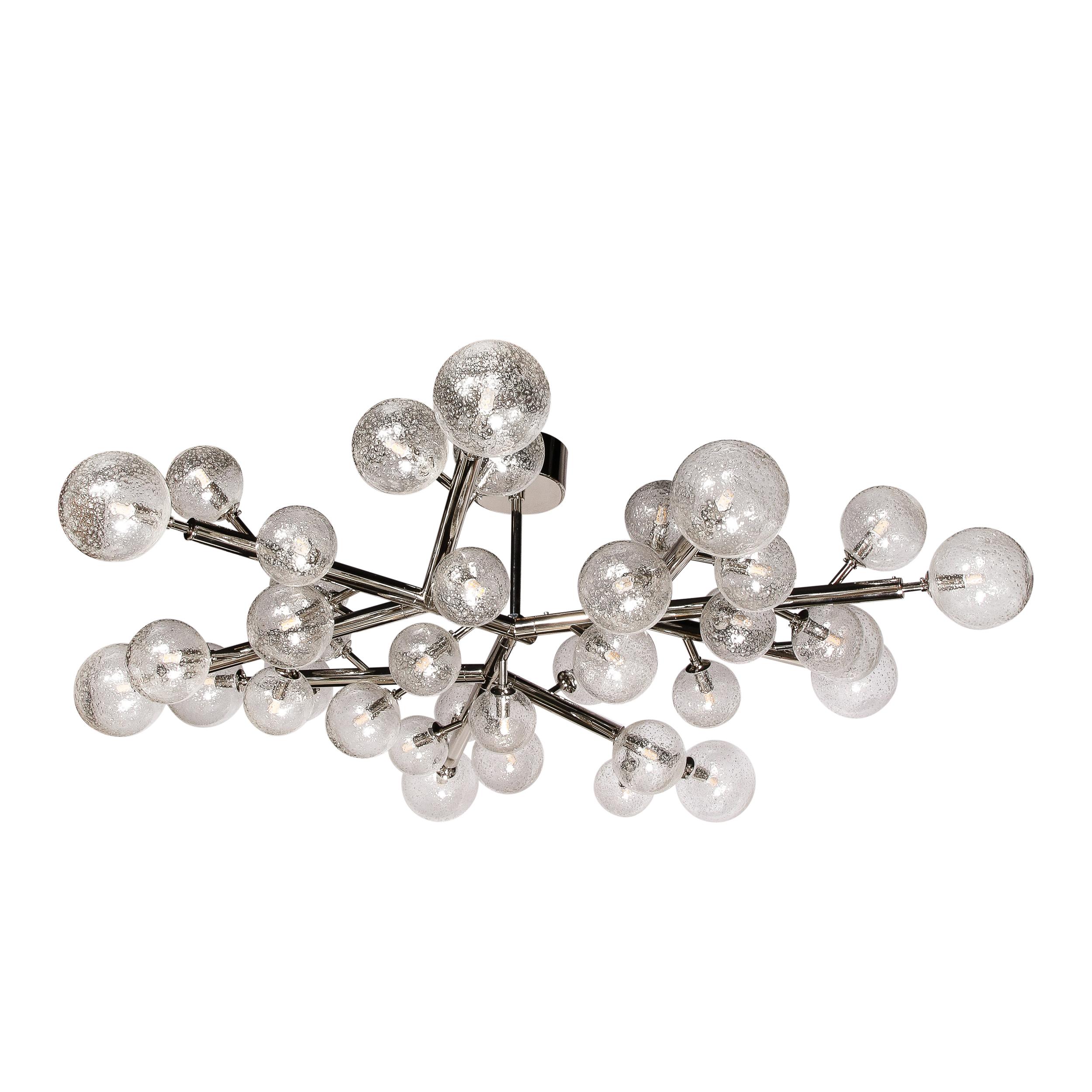 This stunning and dramatic polished Nickel and Handblown Murano glass Molecular 