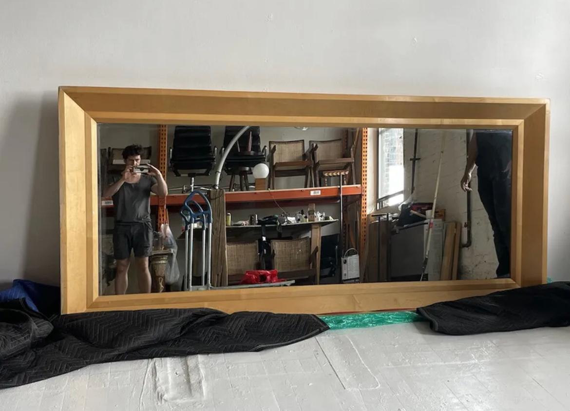 This was a custom floor mirror designed for the Delano Miami Hotel renovations, overseen by Philippe Starck in 1994. 

This mirror does not have any identifiable logos or signatures. We do not have provenance documents. Purchased from a 
 Manhattan