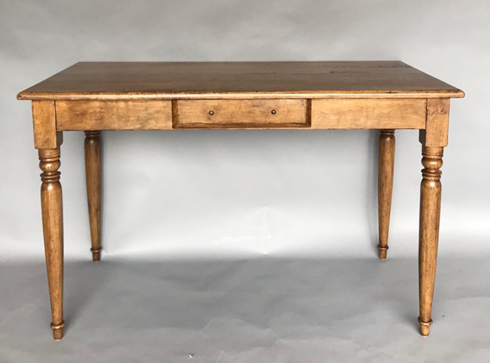 Custom farm house style writing desk with pencil drawer. Can be made in any size and finish. As shown here in a light walnut with light to medium distress. 26 inches clearance from floor to apron on a 30 inch tall table. Also a great design for a