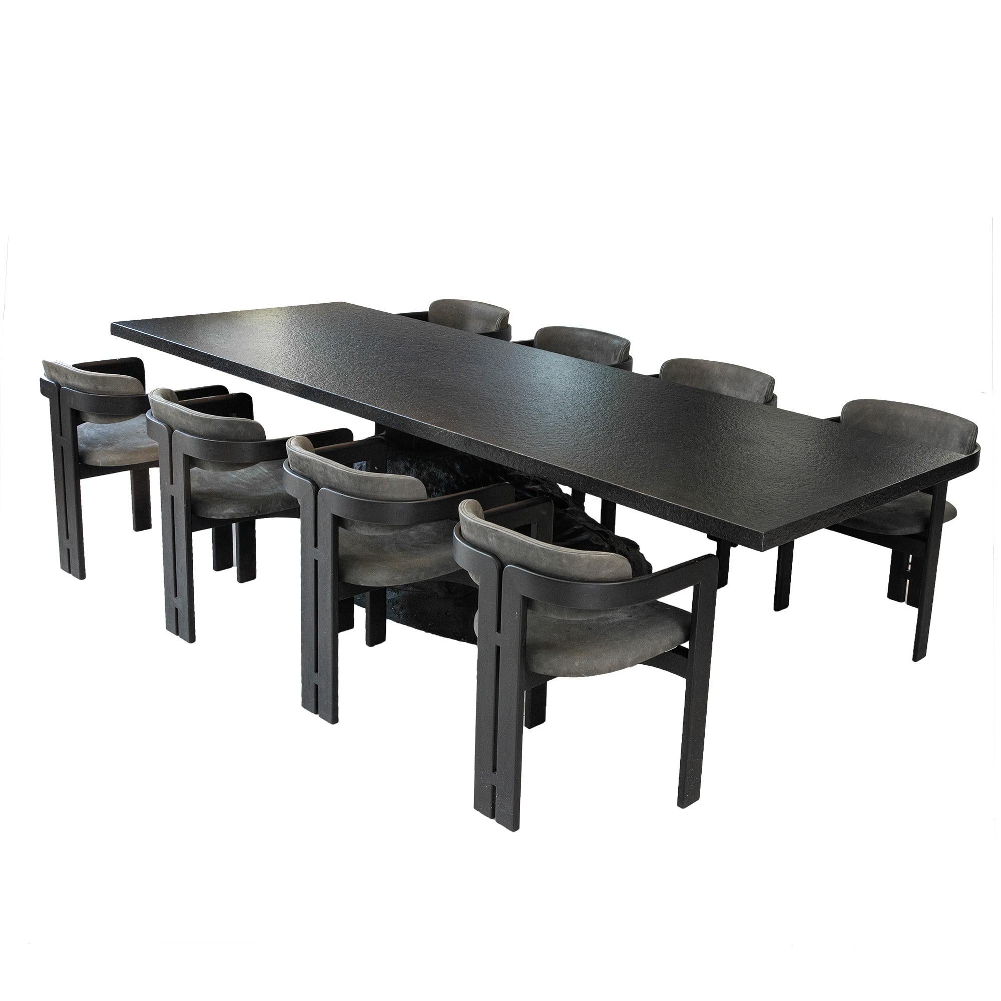 Custom dining table that seats 8 comfortably. Organic modern style. Custom designed, 1 of 1. Faux boulder with tabletop. Minor wear and tear associated with age and use. 