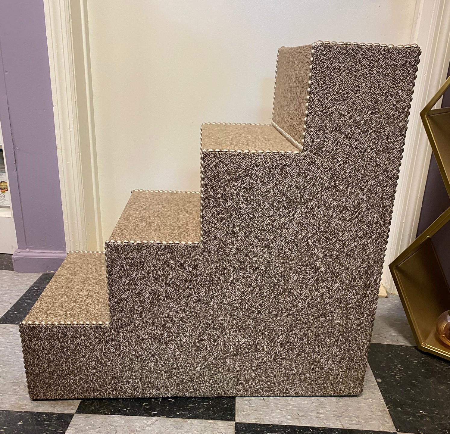 Custom made faux shagreen steps in a taupe/grey accented with silver nail heads. This can be used as a side table with things displayed on each step, step stool or steps along side your bed for a small dog to use as a ladder! Made with a material