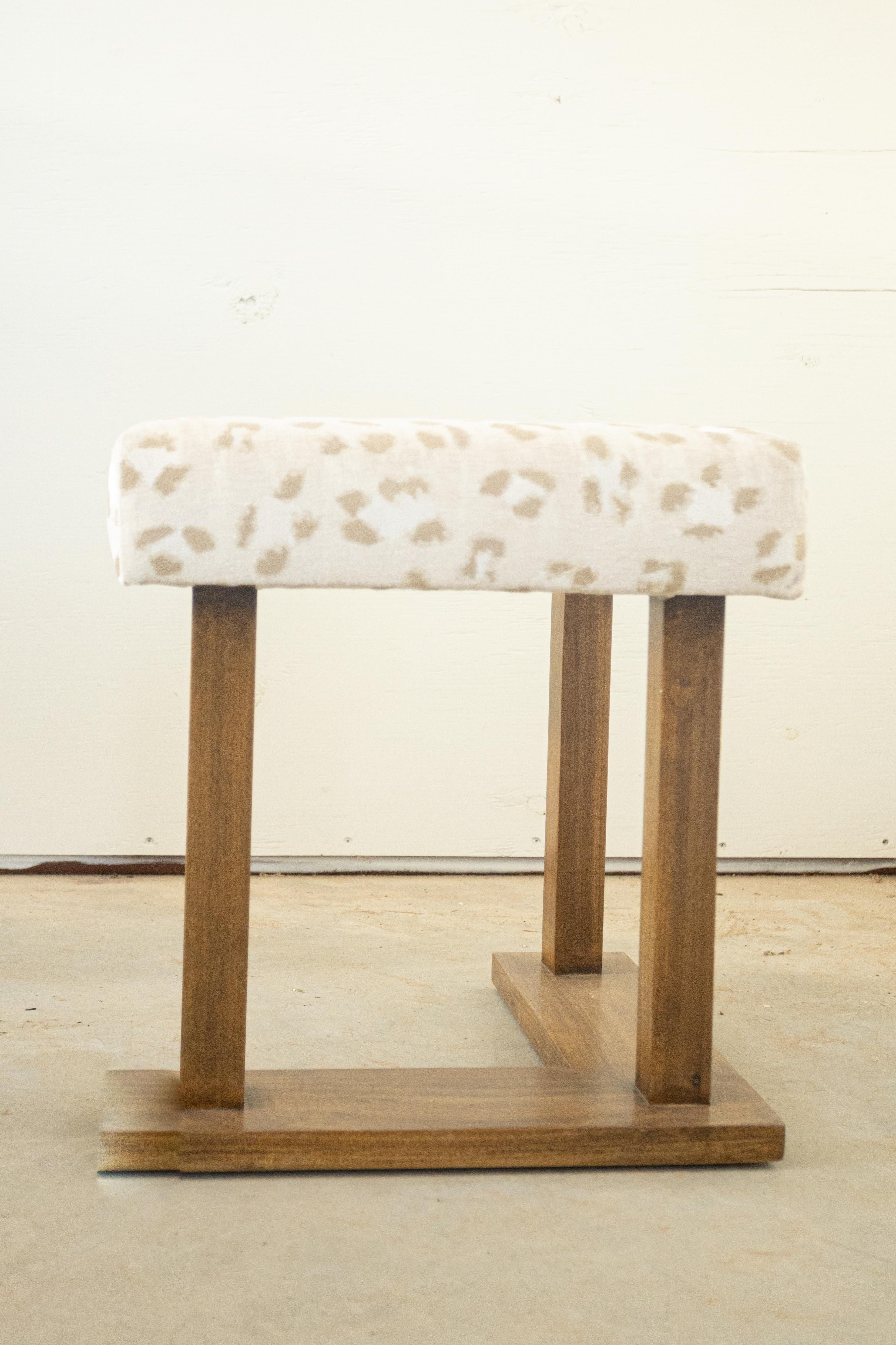 Transform your living space with our custom-made fire surround bench / fender, beautifully upholstered in luxurious Scalamandré fabric. This stunning piece combines elegance and functionality, providing a cozy seating area that enhances the charm of