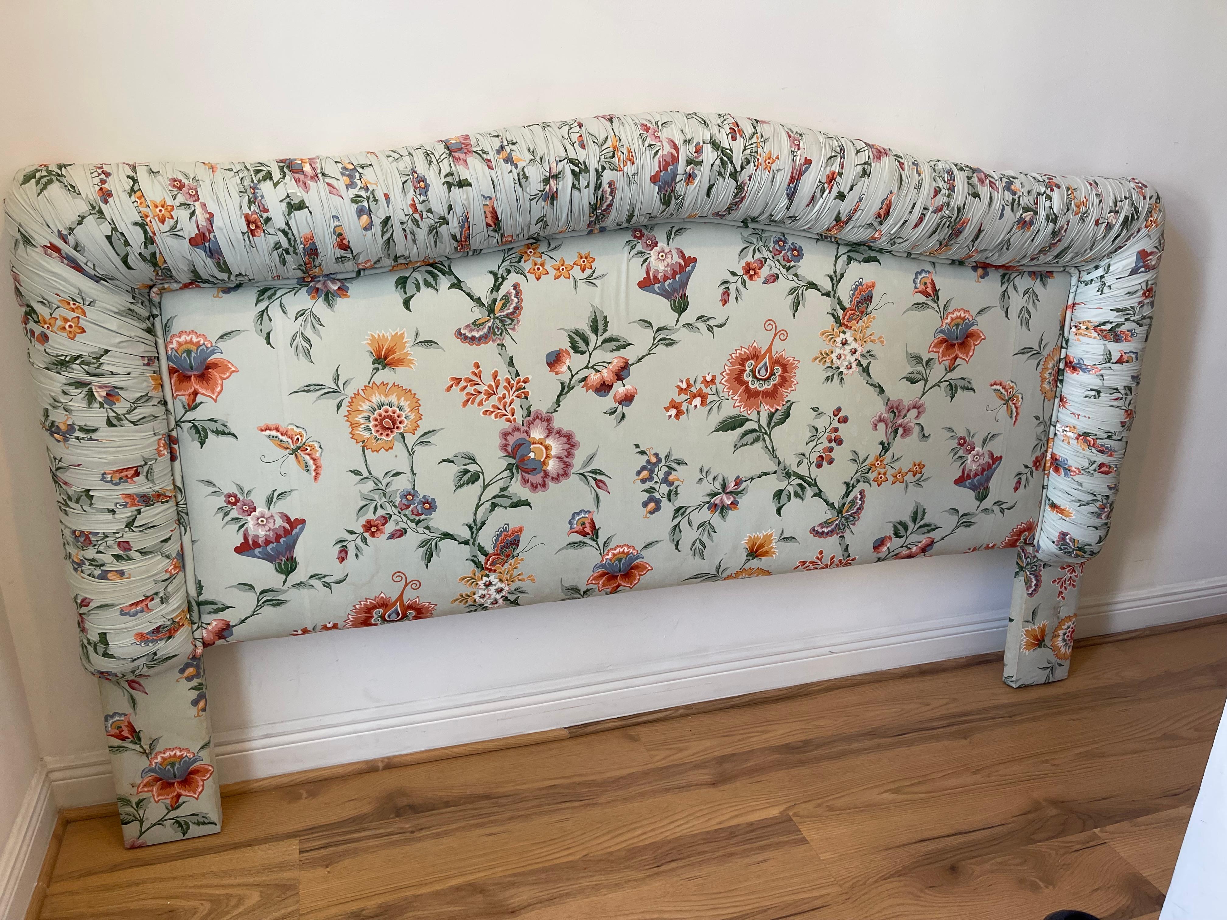 Spectacular mid 20 th c custom upholstered in chintz fabric king headboard. Blue background with orange flowers. Great condition. 