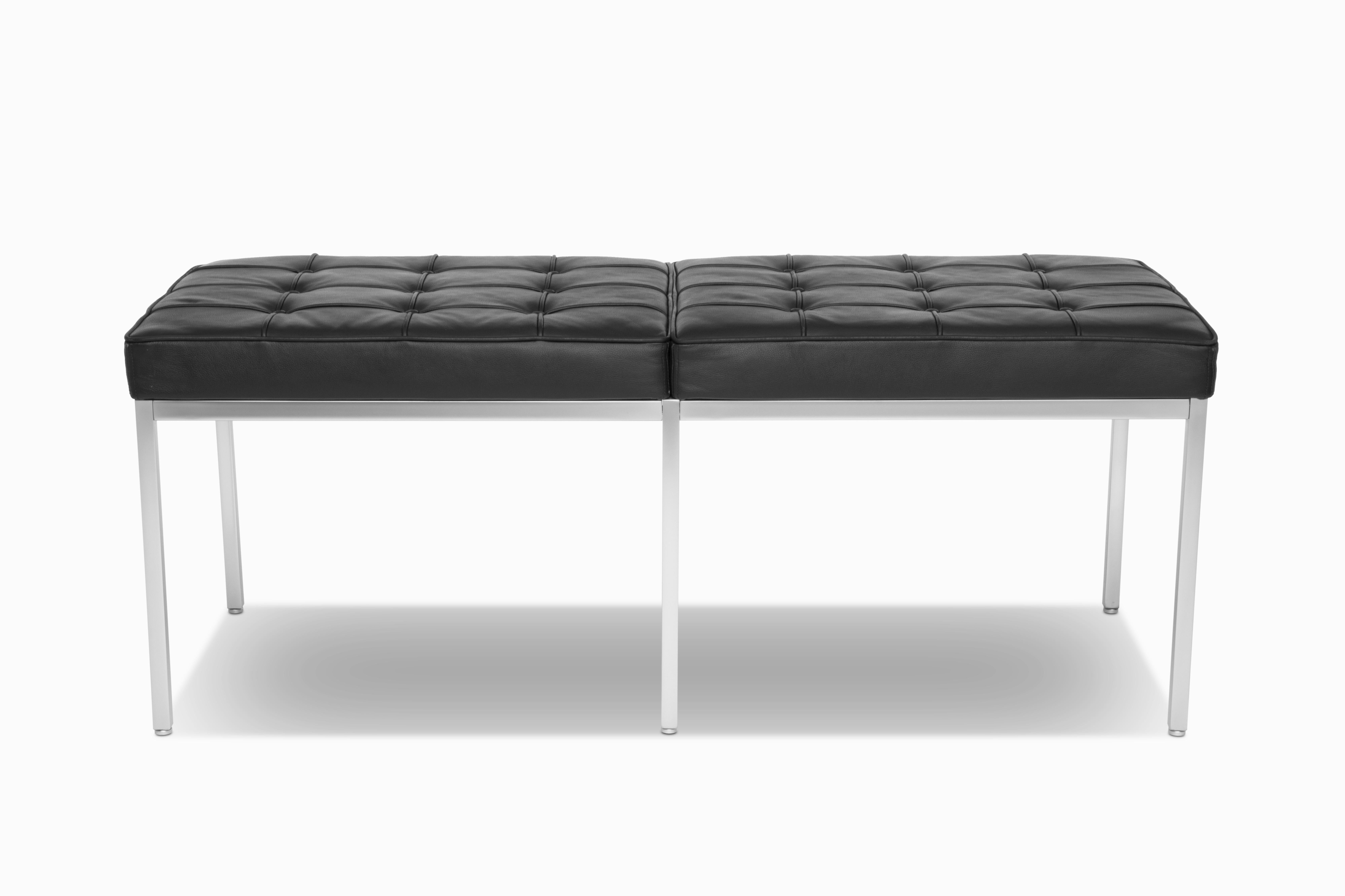 Here is a fantastic, custom-sized bench designed by Florence Knoll circa 1954.  This example was produced in 2017, originally for a retail setting and is excellent condition.  The bench is made of beautiful thick black leather and a satin finished