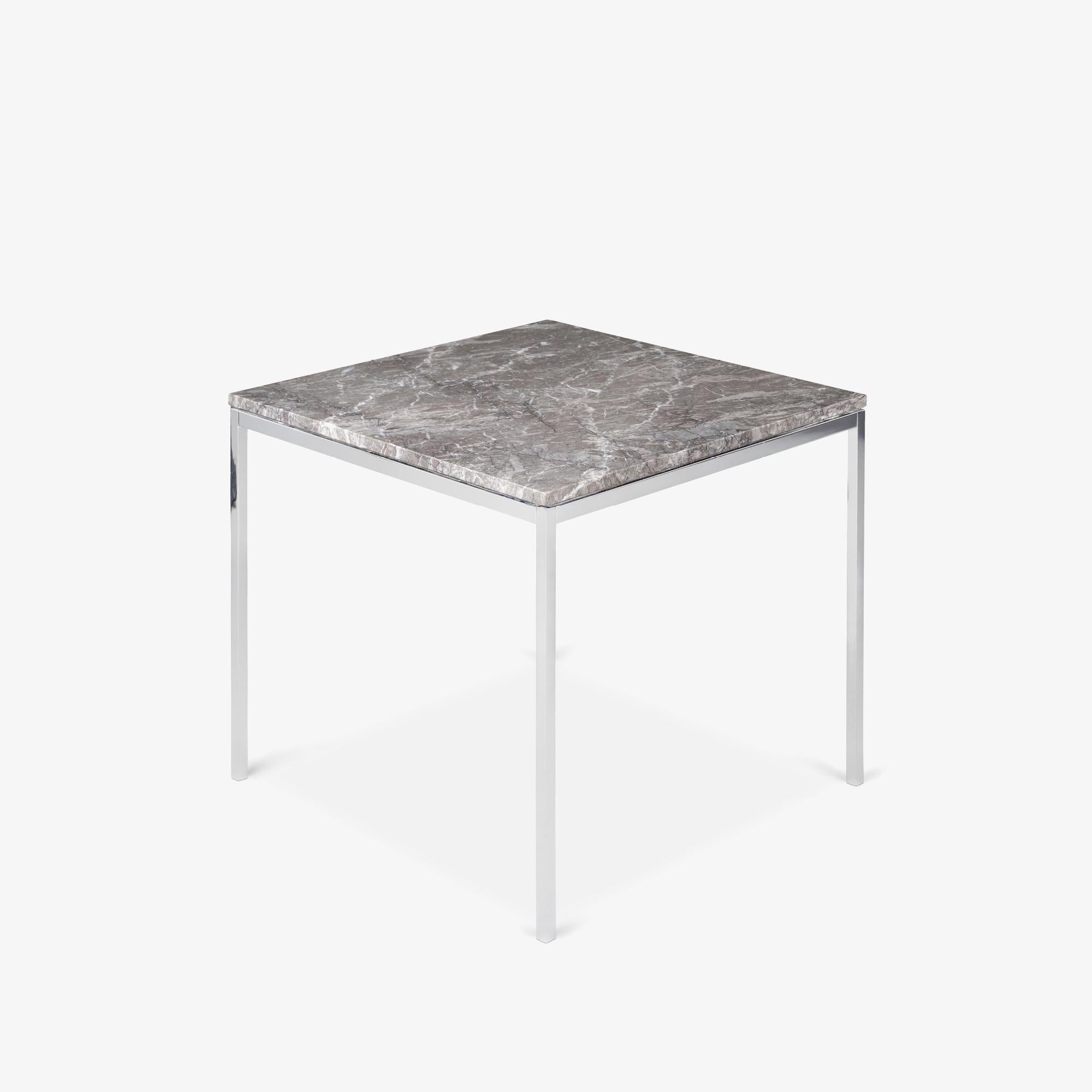 Florence Knoll's transformative impact on Mid-Century design is evident in every piece bearing her name, including this elegant dining table. A pioneer in interior design, Knoll founded the renowned Planning Unit, serving clients like IBM and CBS