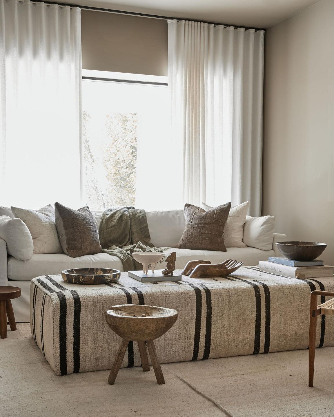 The Gemini Ottoman is a coffee table sized ottoman, designed by us and hand made right here in Canada.

Dimensions 42 x 32 x 16

Upholstered with a Vintage Turkish Kilim Rug

Our Gemini Ottoman can be created in custom sizes and kilim fabrics.