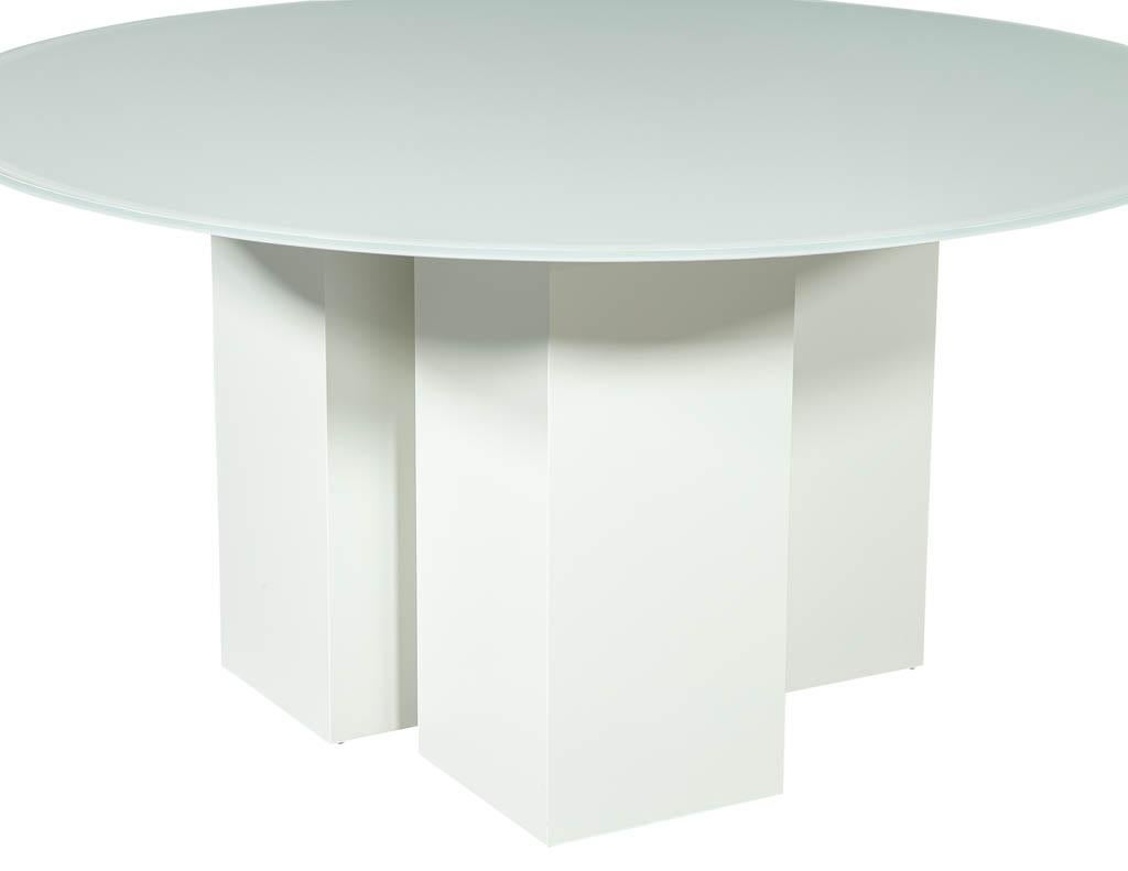 Custom geometric base glass top dining table. Geometric lacquered bases create a dimensional setting for this round back painted glass dining table, custom made by Carrocel.
Price includes complimentary curb side delivery to the continental, USA.