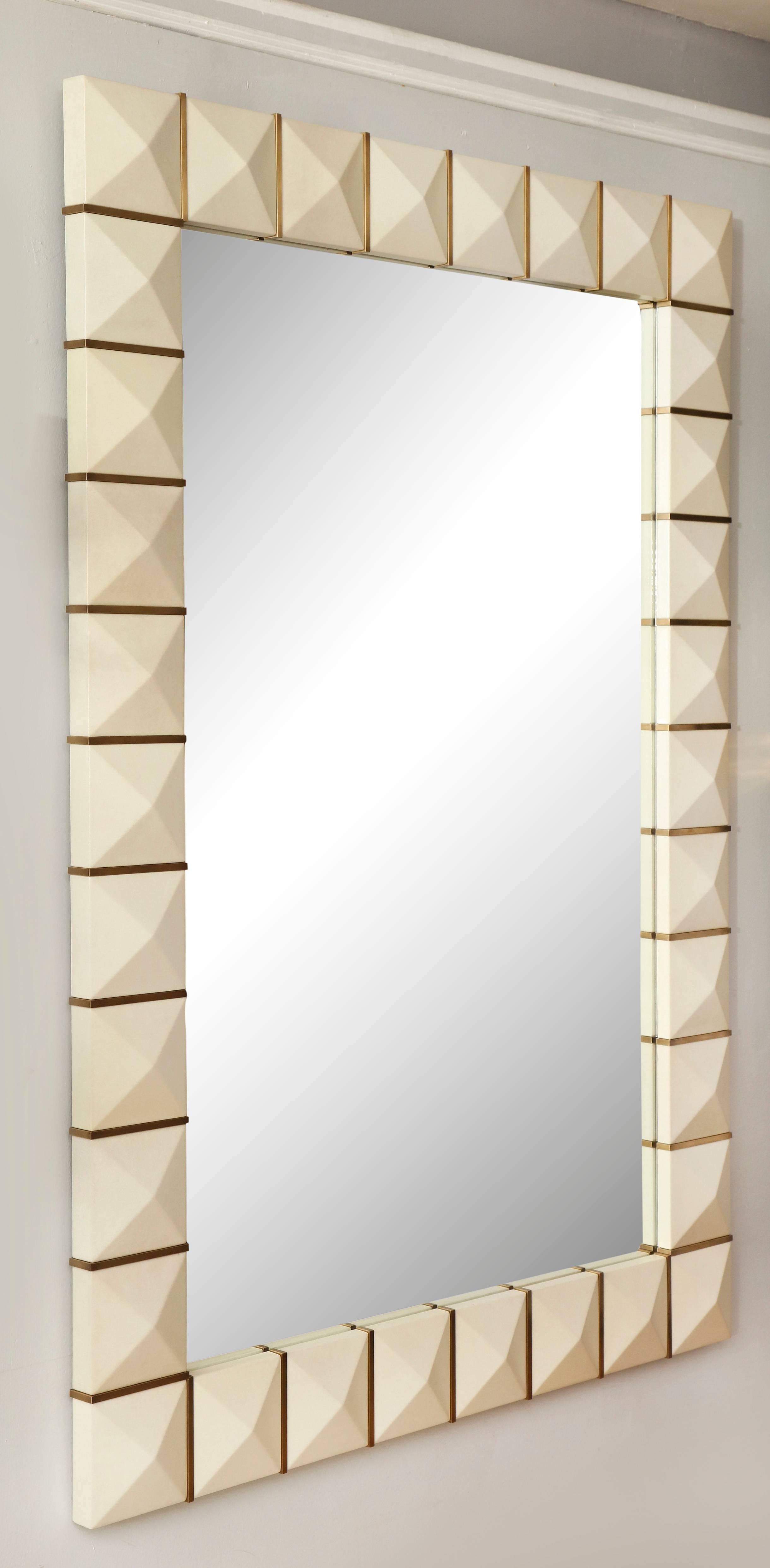 Custom geometric parchment mirror with inlaid brass. 
Please note that this mirror is customizable to your 
specifications with a lead time of 8-10 weeks.