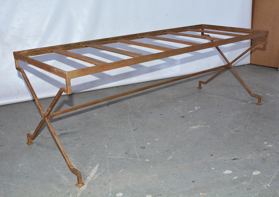 The custom elegant modern gilt metal bench has x-form legs with angular turns reminiscent of the Greek key design.
We can make this in the size you need. The style of this base is appropriate for coffee table or bench. Bench listed is available now.