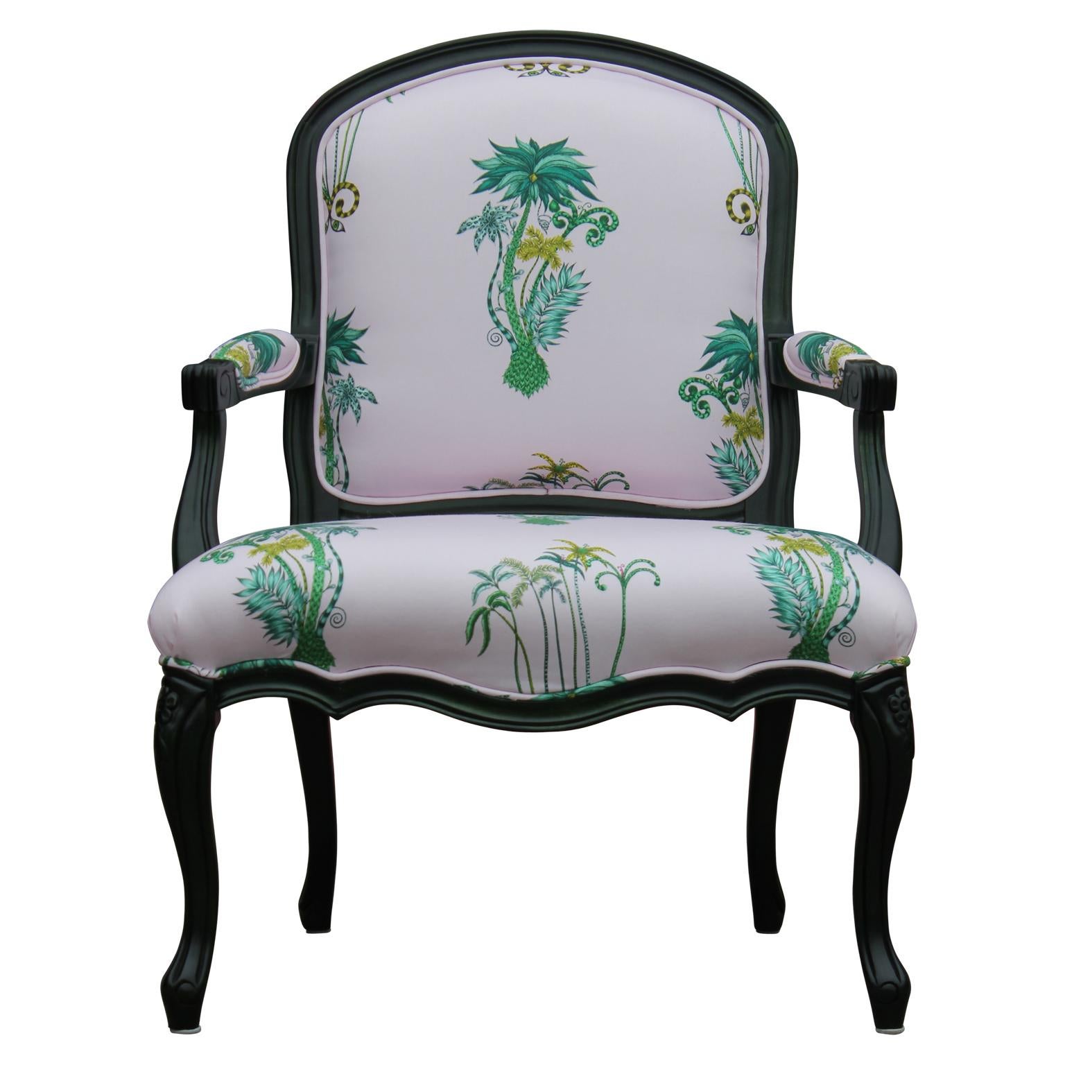 Beautiful Louis the XV style green dyed French armchair with custom pink tropical upholstery featuring a floral palm tree design.