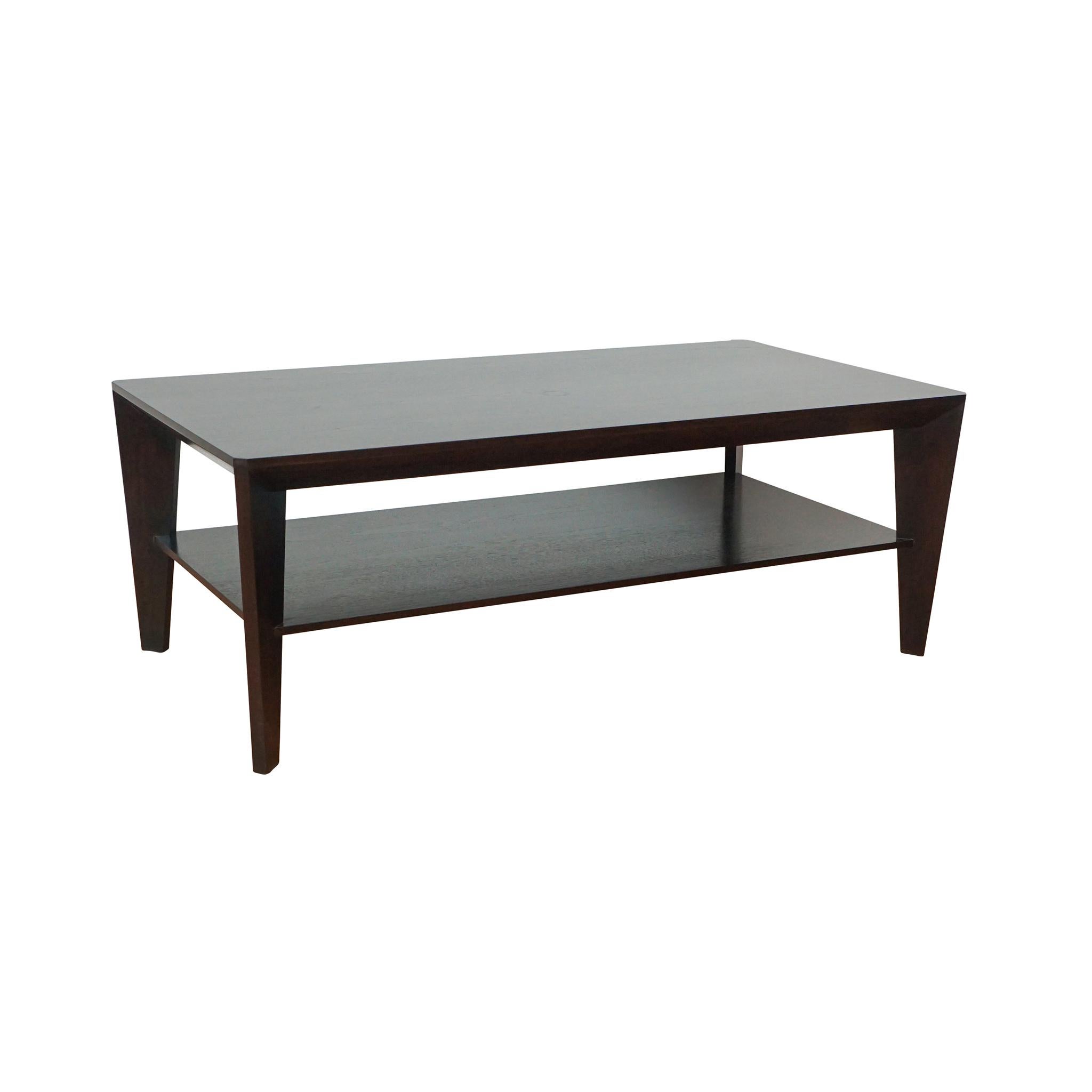 Chic coffee table with multi-sided diagonal base and a shelf. Shown in ebonized walnut.



width: 47