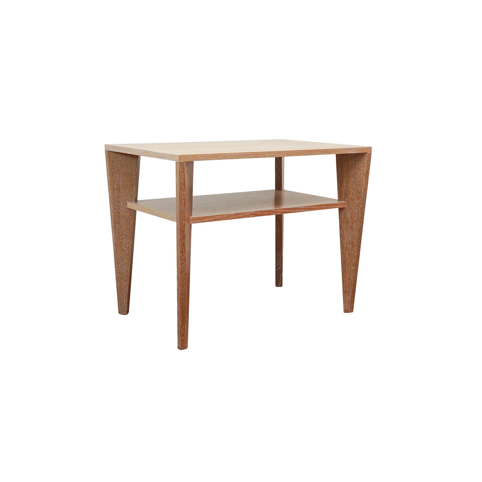 Versatile side table with multi-sided diagonal base and a shelf. A perfect match for Greenwich coffee table.  Shown in medium cerused oak.

Lead time: 6-8 weeks

width: 28