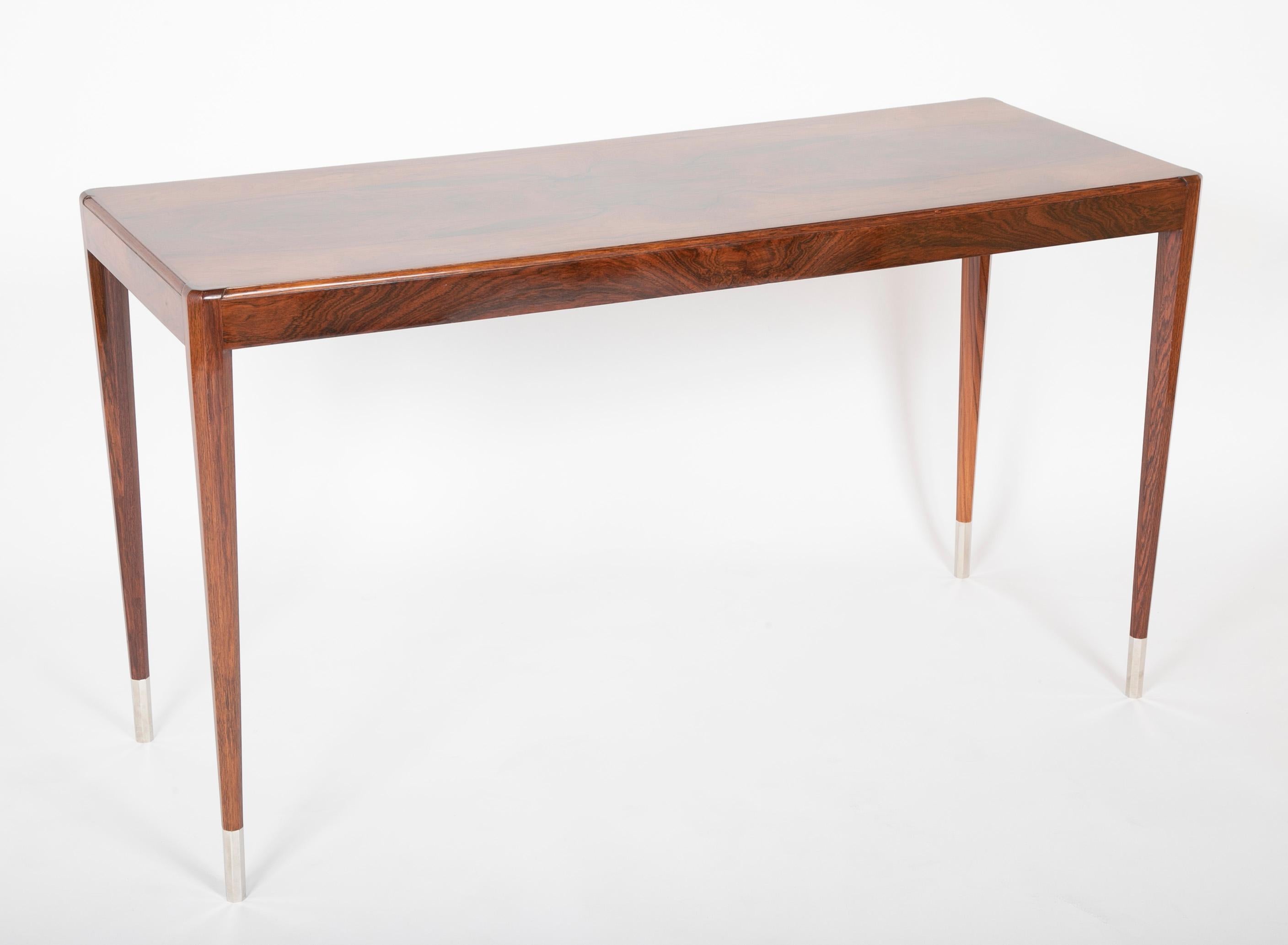 Custom hall table in rosewood on tapered legs to chrome sabots by Dominique, France.  Circa 1930's.