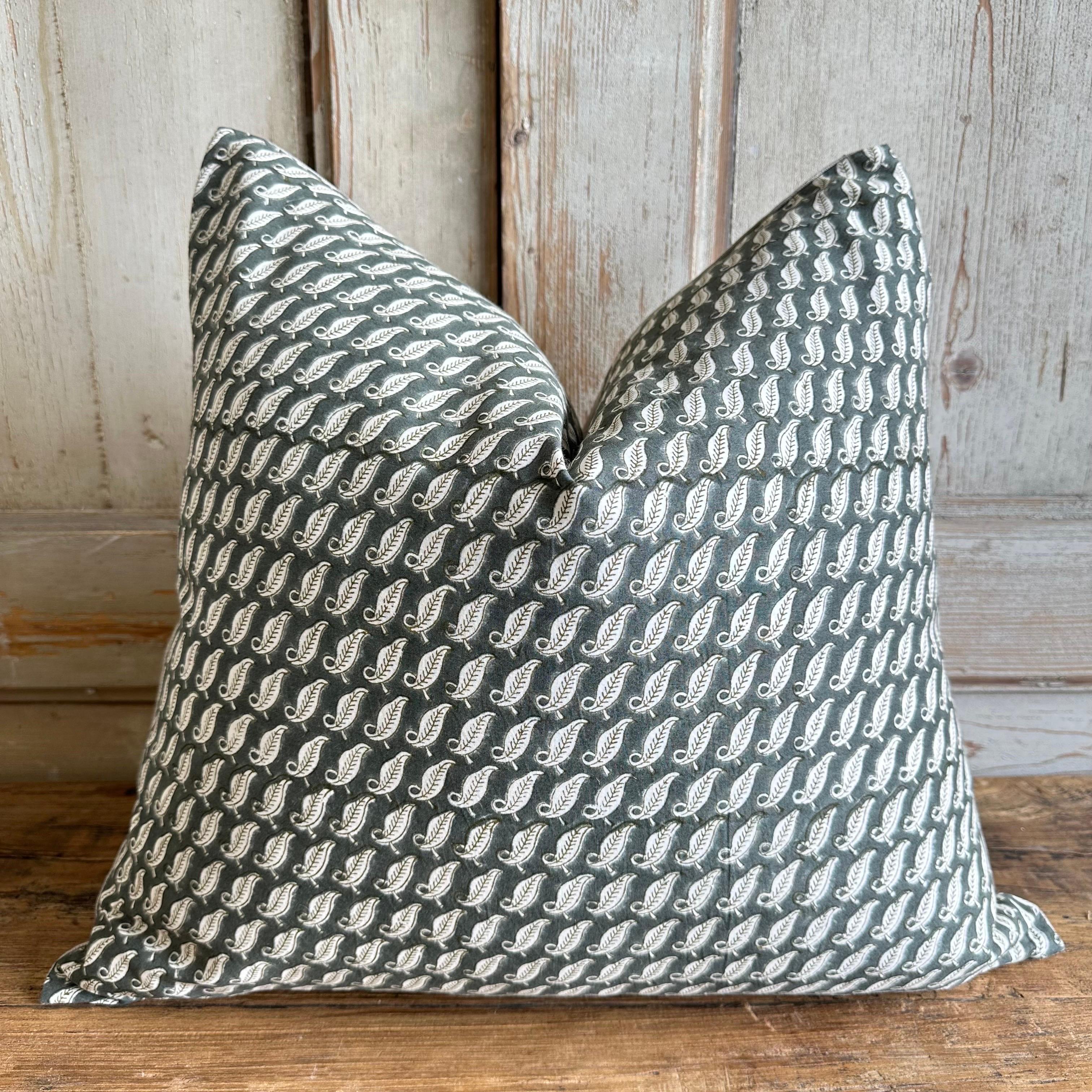 Custom made linen and cotton hand-blocked pillow with down feather insert.
Size: 22 x 22
Color: a deep blue gray hue, with white leaf pattern, backing is in a solid natural linen, with hidden zipper closure.
Machine wash cold
Lay flat to