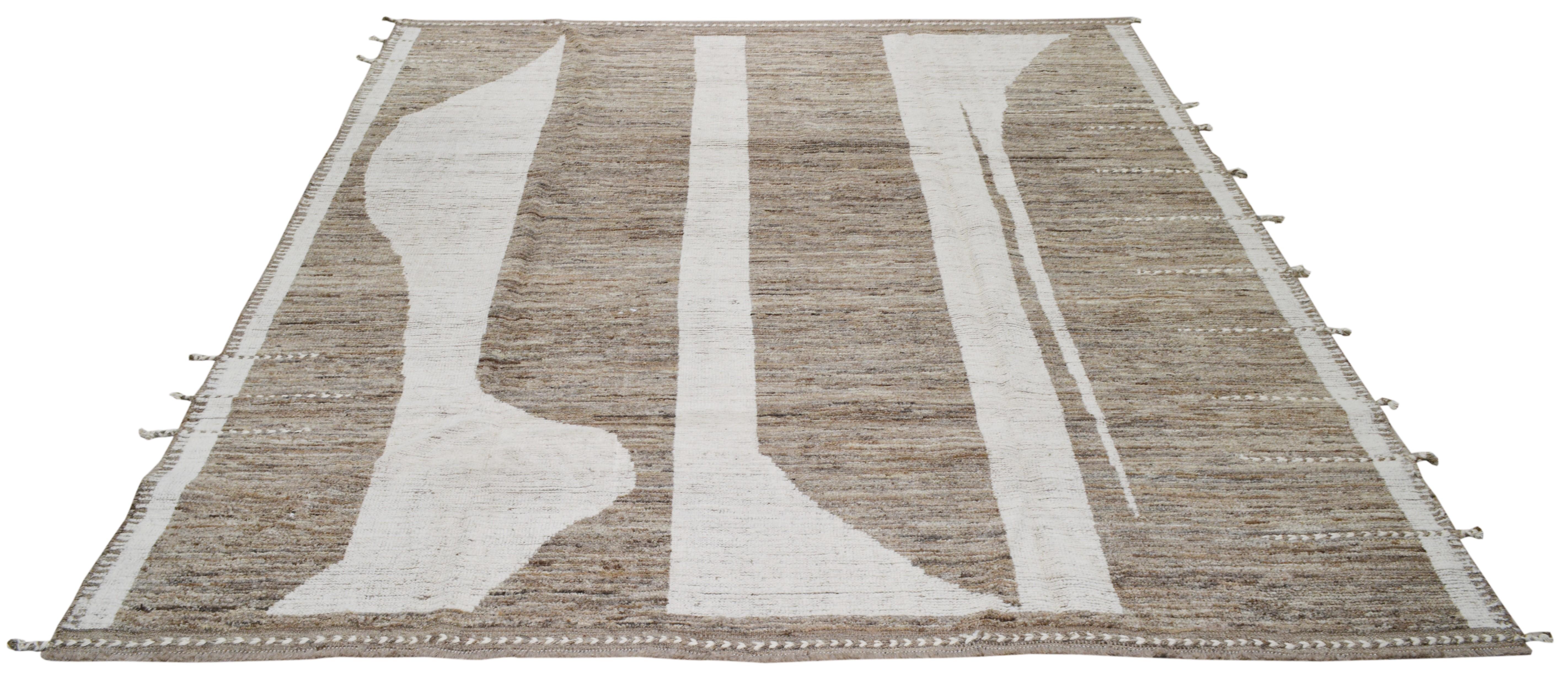Moroccan Rug
100% Wool hand knotted / hand made Moroccan rug
Color: Sand, beige, brown
Natural earthy colors look great with all styles, and will compliment any room.
Style: Abstract rug
Size: 8’10” x 9’10”.