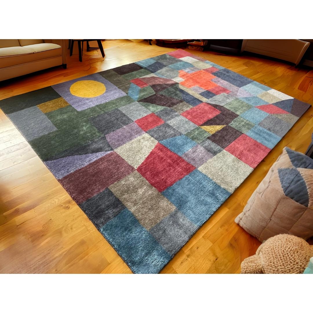 Custom hand knotted rug based on the painting “Fire at Full Moon” by Paul Klee.

Size: 250 x 194 cm (8.2 x 6.4 ft). Further sizes, also bespoke, available.

Colors: 20 custom-dyed colors. Main colors of the rug are dark blue, purple, brown and two