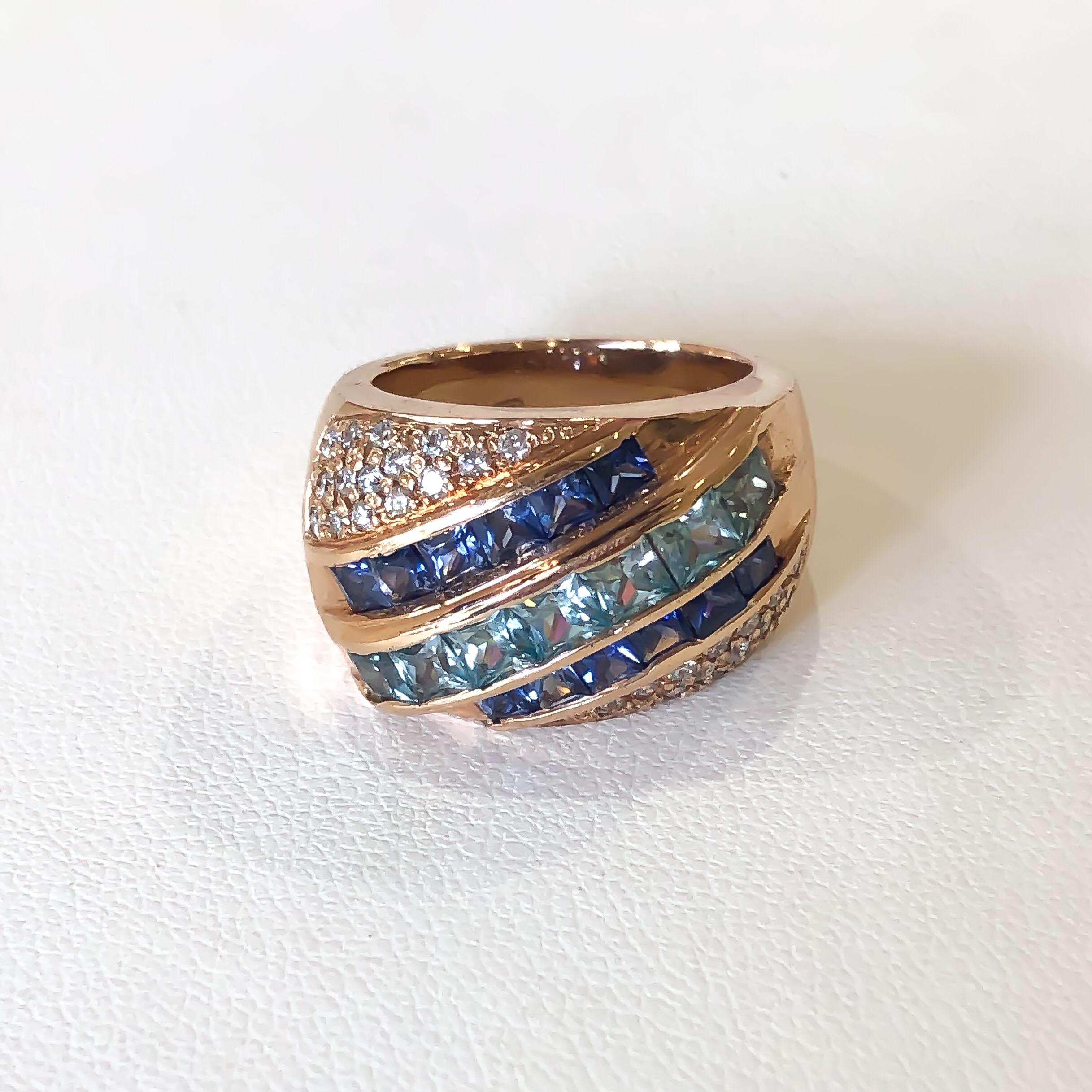 Natural blue sapphire and blue zircon ring designed and handmade by Mark Areias Jewelers. Fashioned from 18 karat rose gold hand set with princess cut natural vibrant sapphires and zircons. Two rows of 3.00 mm square blue sapphires channel set on