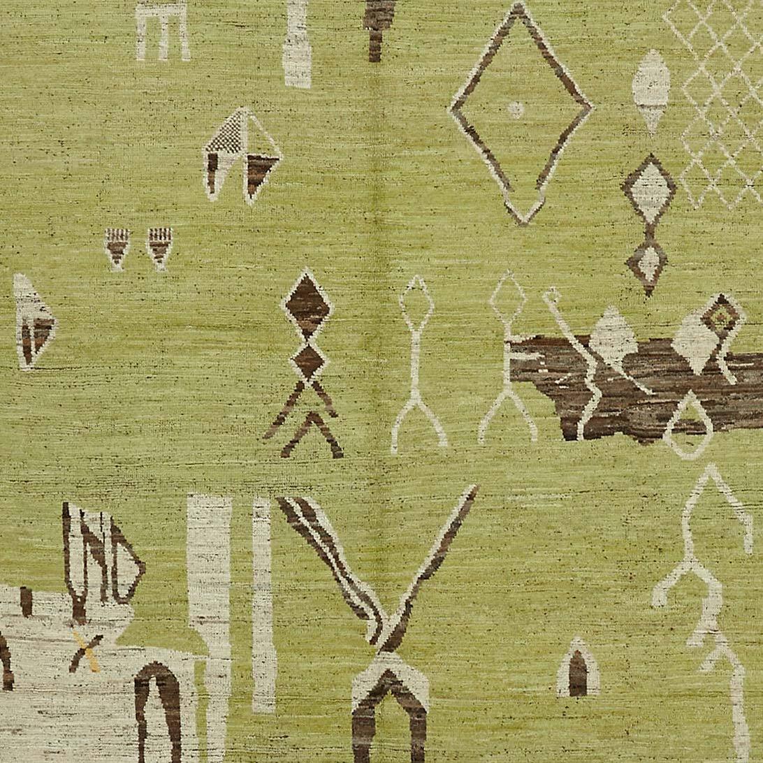 Elevate your living space with the exotic charm and contemporary elegance of this modern handknotted Moroccan style Turkish Tulu rug, crafted from 100% wool. This exquisite piece brings together the lush texture of Tulu rugs with the bold, geometric