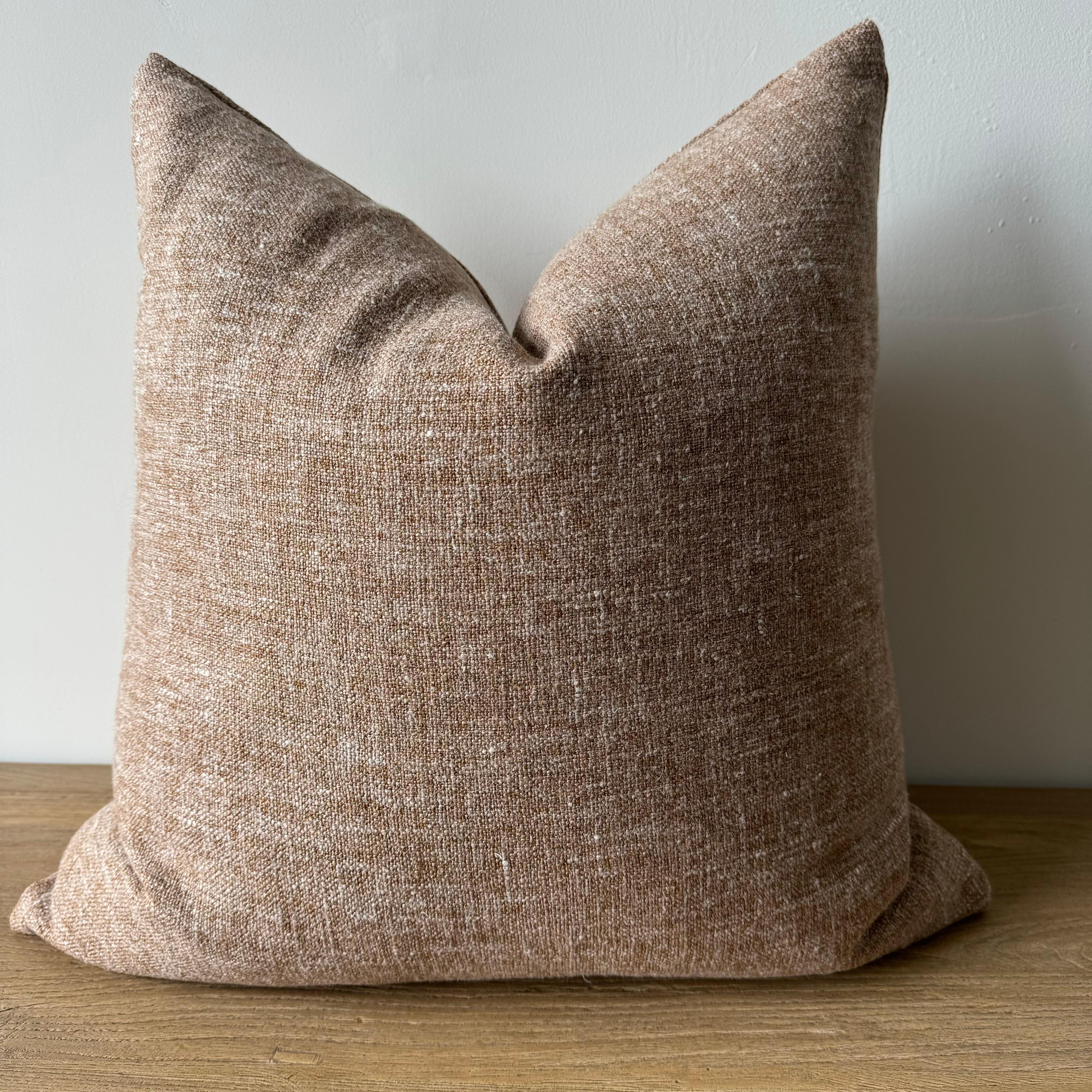 Bejmat Brown with hues of terracotta and natural flax oatmeal woven fibers in a stonewash finish create this luxurious soft pillow. Sewn with an antique brass zipper closure and overlocked edges.
Includes a down/ feather insert.
Size: 22 x 22
-52%