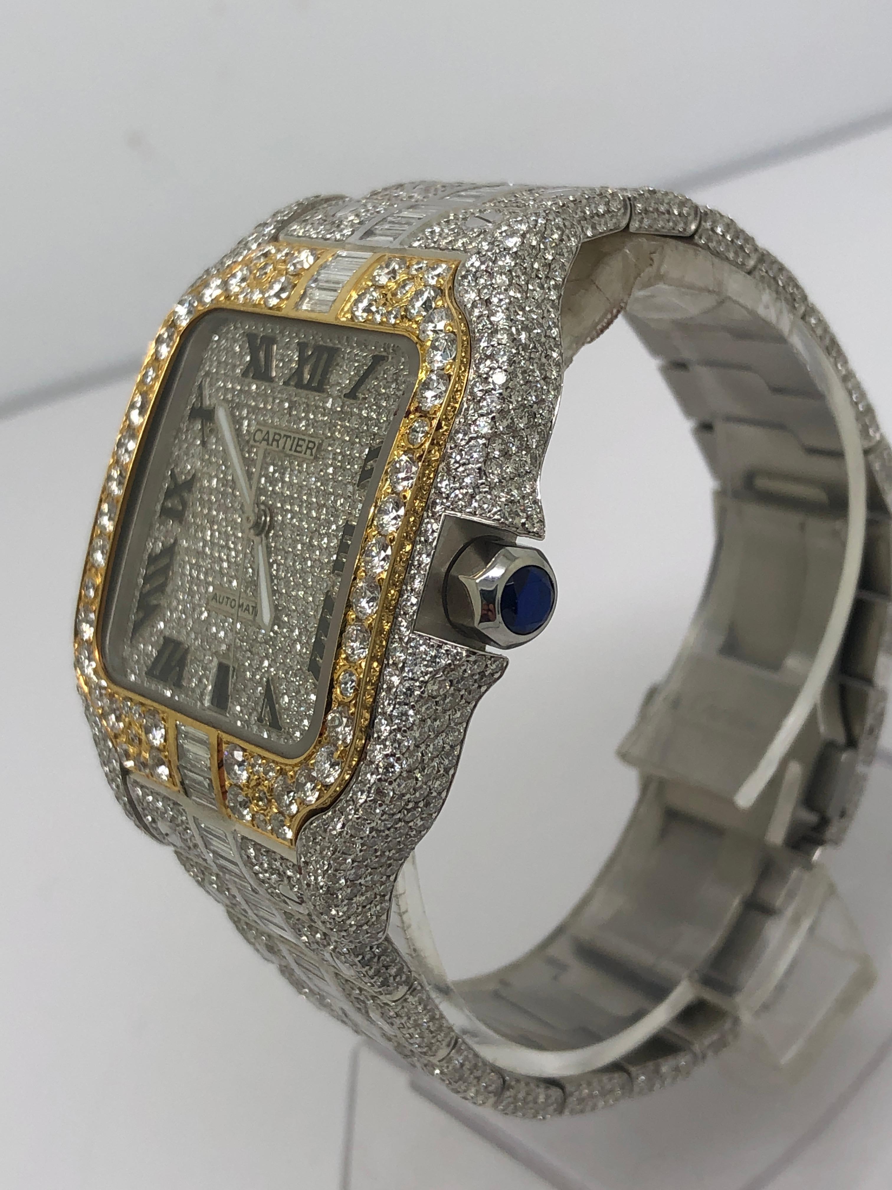 100% Authentic Cartier Santos Iced out completely with collection quality vs white natural round and emerald cut diamonds

!! WE HAVE EXTRA LINKS AVAILABLE!! G COLOR VS1 CLARITY
26 carats in collection quality diamonds

fully iced out diamond dial