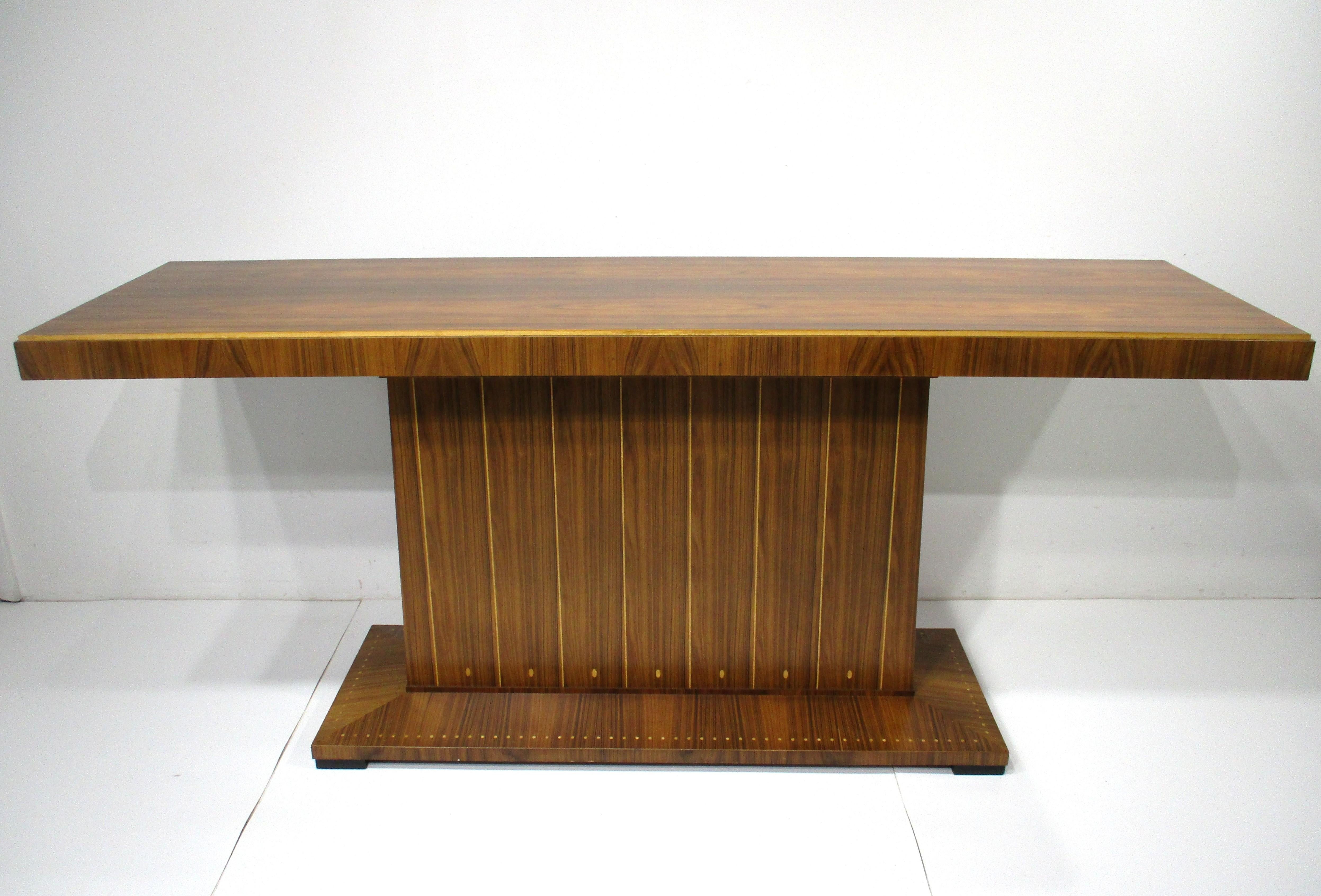 An exceptional and stunning one of a kind custom handcrafted bar in rich well grained Indonesian mahogany with lighter wood accented inlays . Fashioned in the manner reminisce of the Riva boat companies high end work in mahogany and in it's