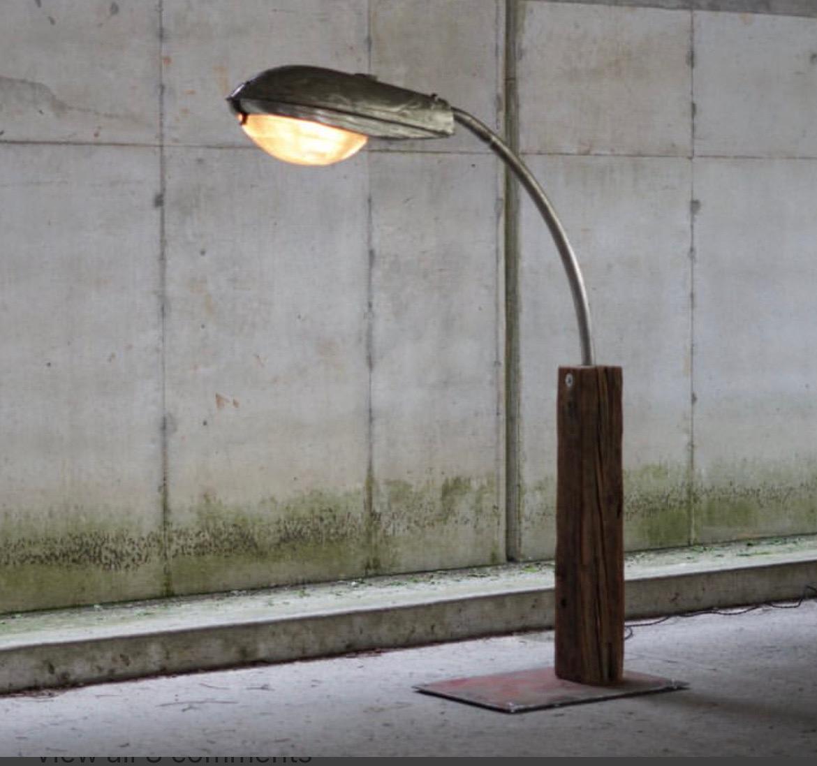 Extra large (6 foot) industrial chic floor lamp. A true show stopper and conversation piece. Made in 2021 in Pennsylvania. 

Unique, custom made industrial floor lamp using genuine General Electric Corporation street light.

Heavy rustic red metal