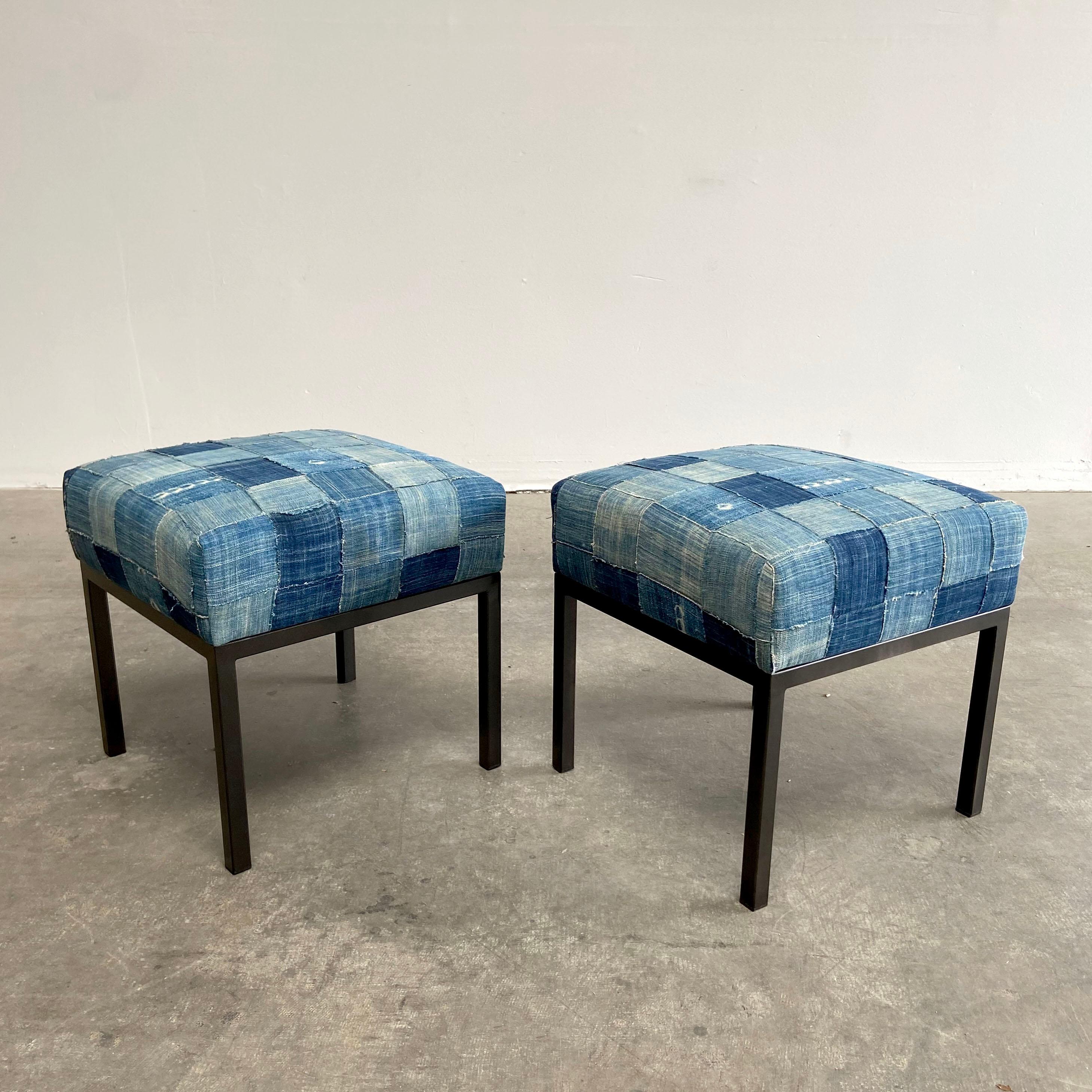Custom made by bloom home inc, we've designed these stools for extra seating.
They are upholstered in a basket woven textured antique indigo blue batik cloth, that has been fully lined. The background color is a beautiful mix of indigo, faded and