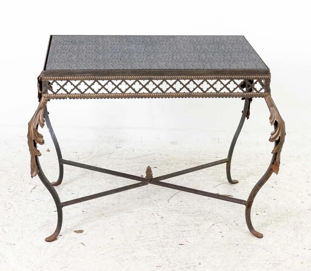 Custom Iron Table with Faux Leather Top and gilt leaves. Made in the 1980's-1990's in upstate NY. Inset faux leather top is replacement of original. Good overall condition