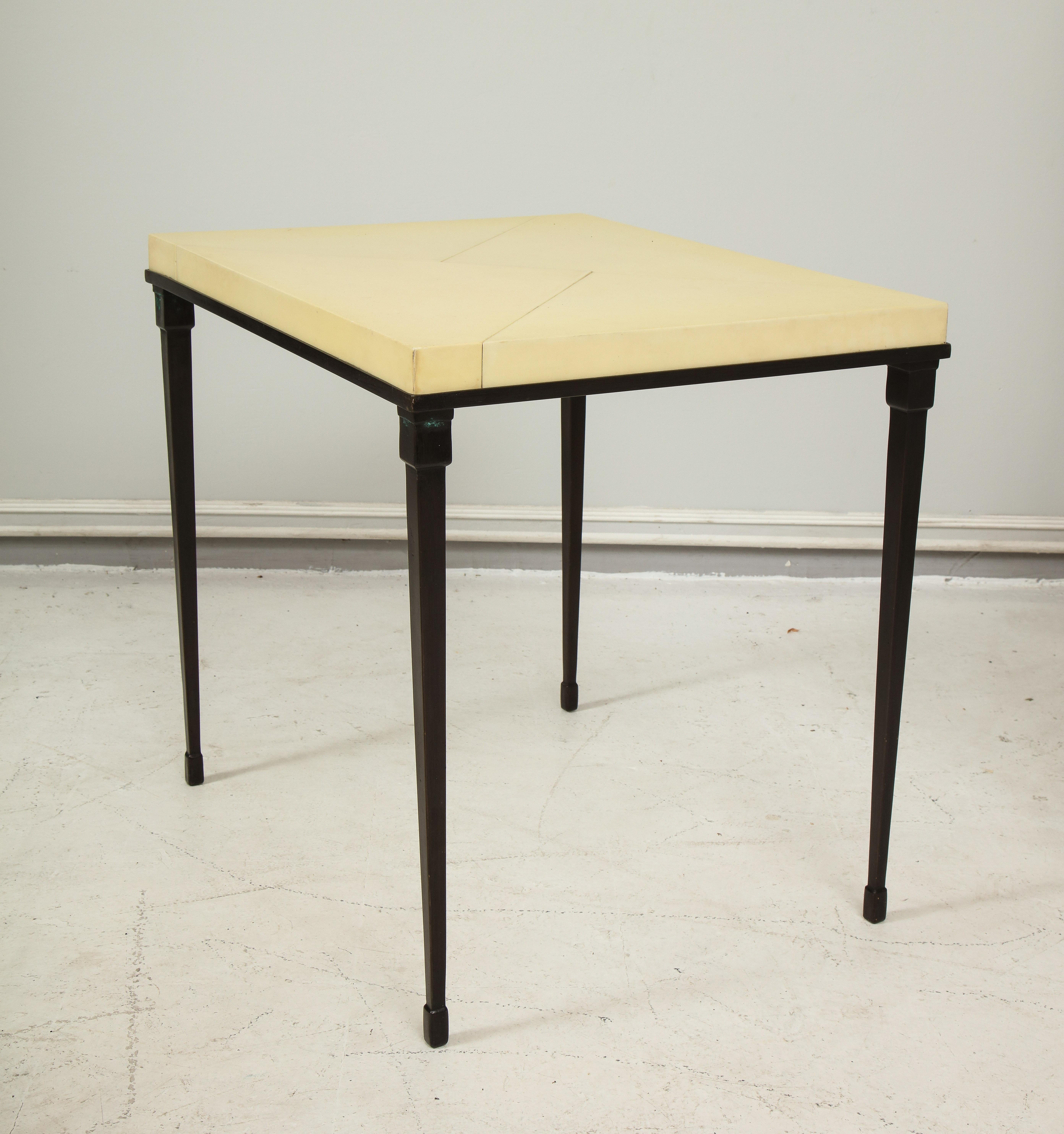 Custom parchment-top table with iron base
please note this table is customizable.