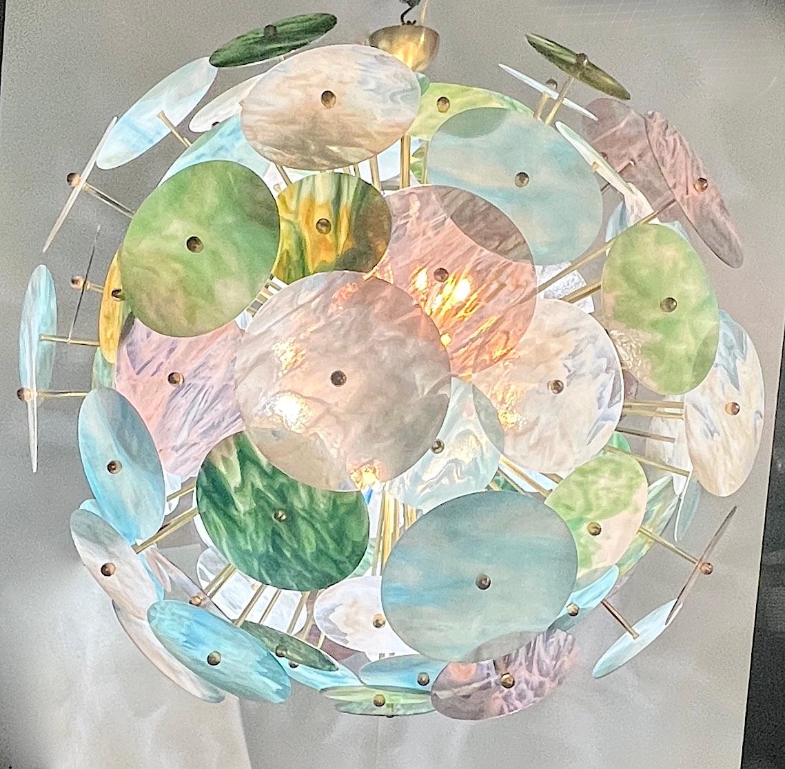 Contemporary customizable Italian exclusive Sputnik chandelier of grand size, entirely handcrafted, an enticing modern round design by Cosulich Interiors & Antiques, with a brass structure composed of a central core supporting jutting out round