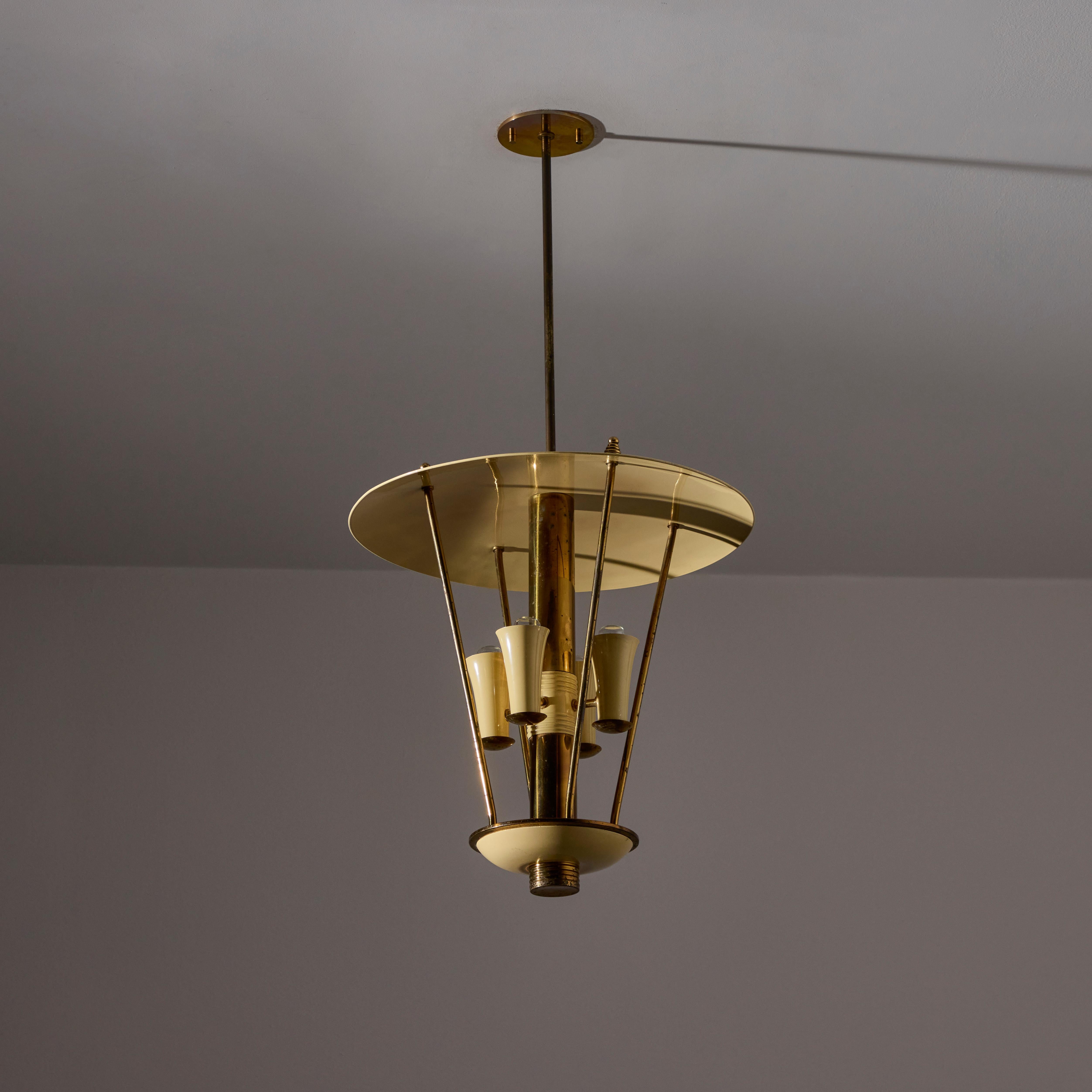 Custom Italian Ceiling Light. Designed and manufactured in Italy, circa the 1950s. Two differential dishes with an exposed lamping house in the middle. Aged polished brass detailing. This light holds four E14 socket-types, adapted for the US. We