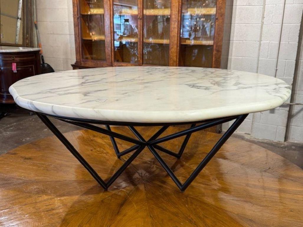 Modern custom Italian coffee table on a steel base.  A unique table that makes a beautiful statement.  Great quality as well.  Lovely!
41w x 16.5h