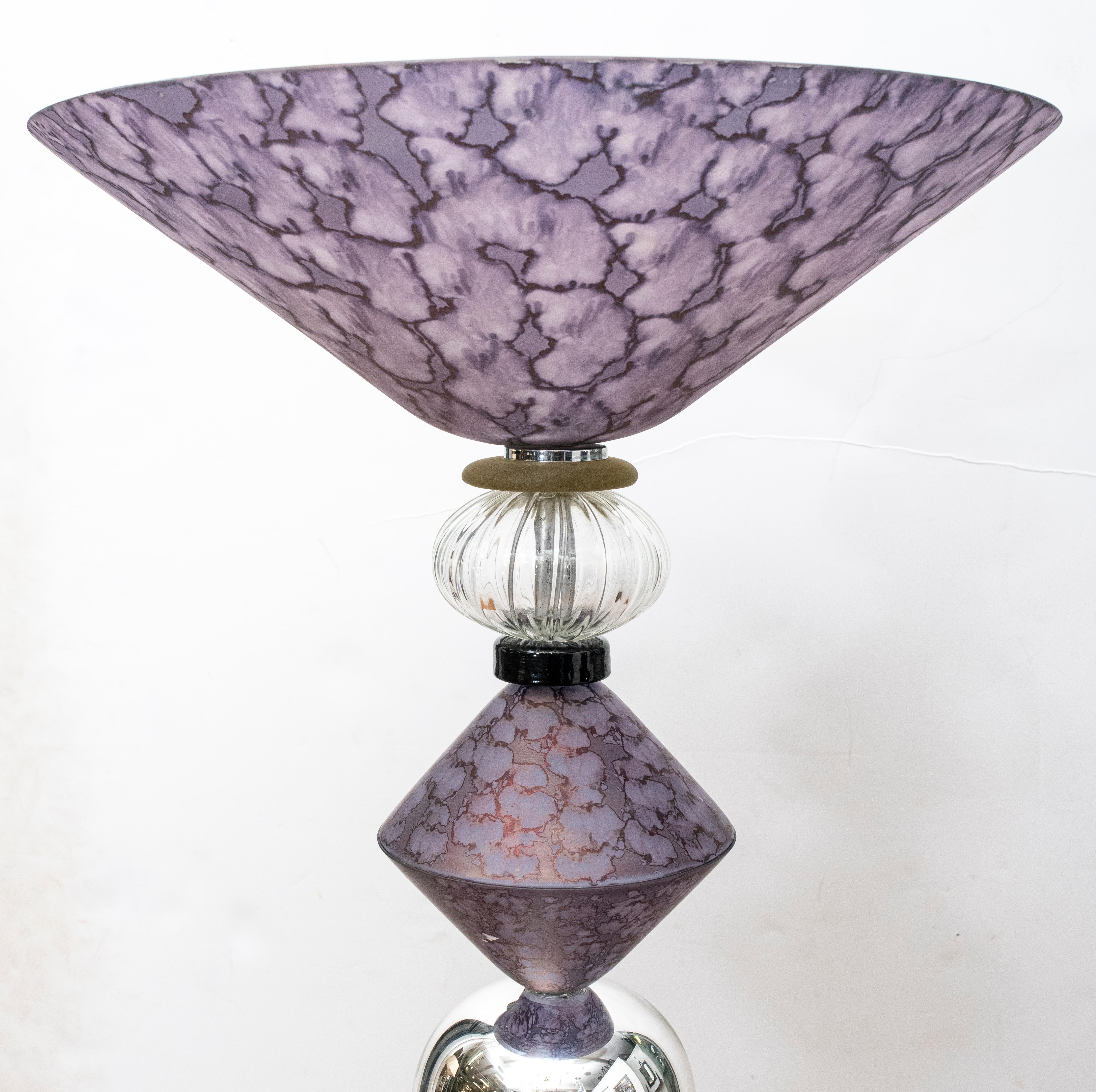 Italian Postmodern pair of custom made Murano glass floor lamps with amethyst glass highlights, with copper metallic finish and crystal elements, on polished nickel bases. Purchased from Cosulich in 2014.

Measurements: 65.5