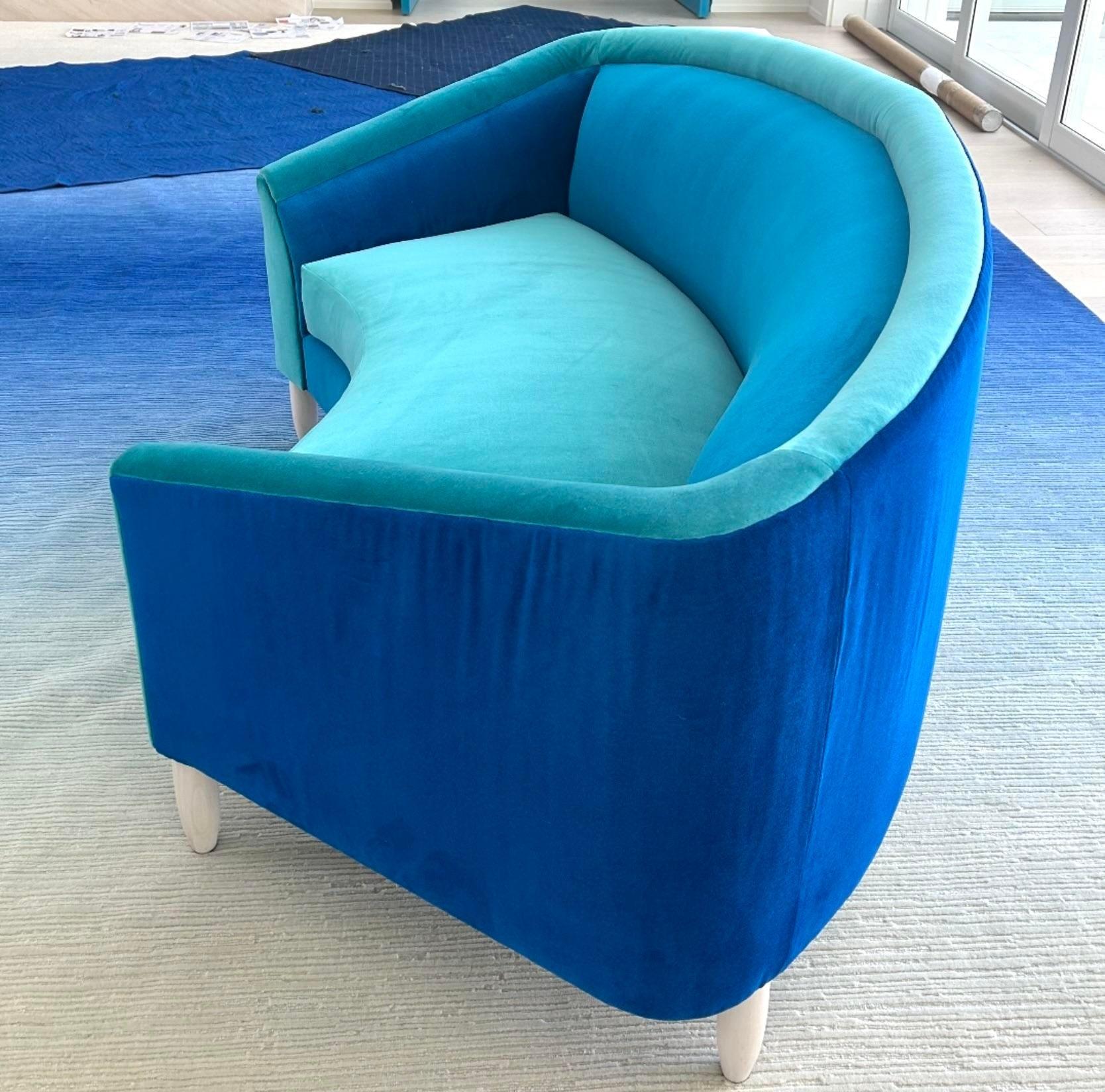 A spectacular custom curved sofa. Designed by the celebrity designer/author Janie Molster. A chic color block design in Holly Hunt performance velvet fabric. Two sofas available on my  page. Acquired from a Naples estate.