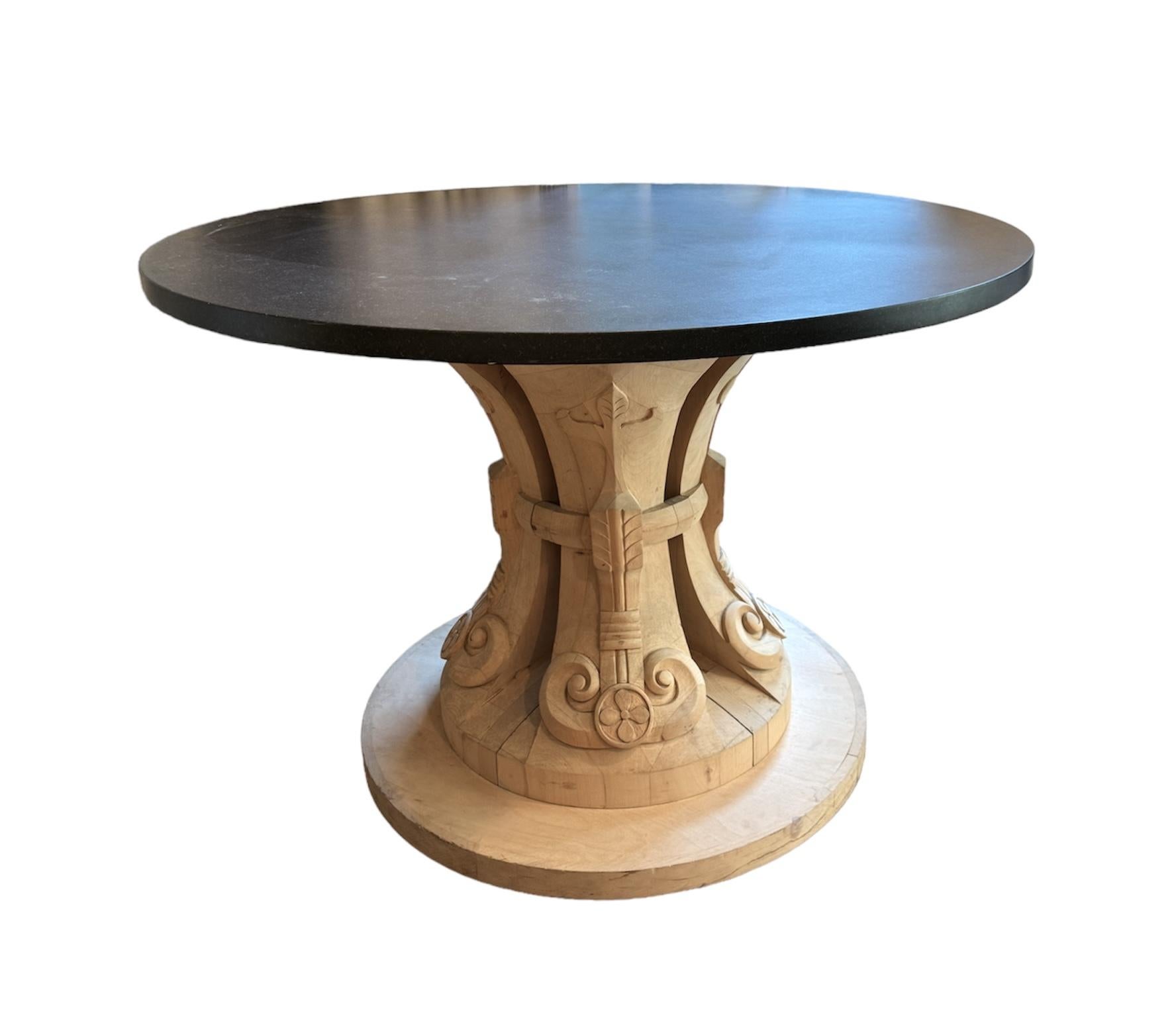 Transform your living space with this exquisite custom carved Javanese table, a masterpiece that seamlessly blends elegance and functionality. Crafted with precision, its honed black granite tabletop exudes sophistication while offering durability