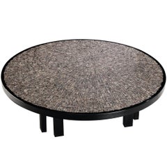 Mesa baja Jean Claude Dresse de granito a medida